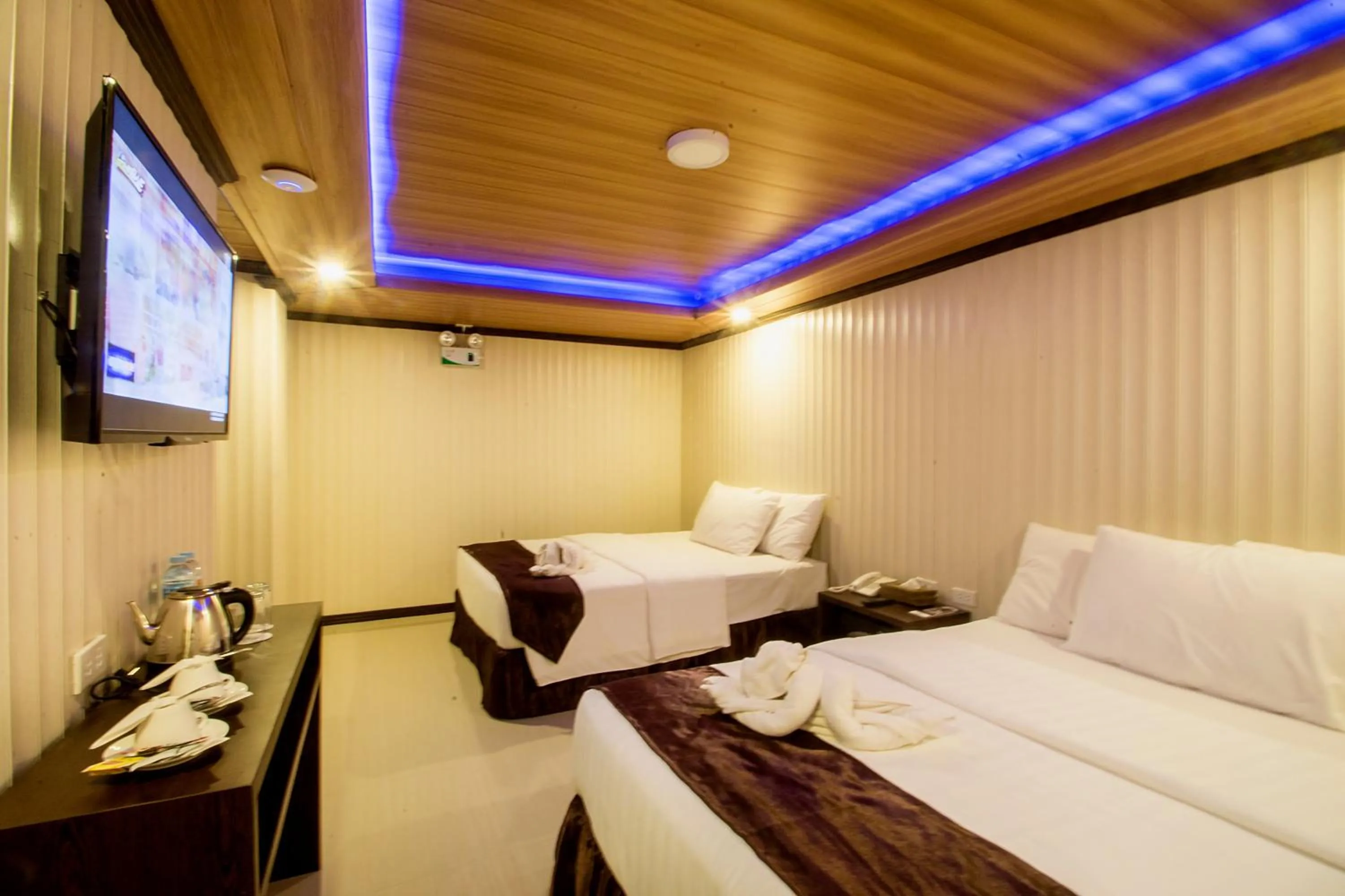 Bed in Diamond Water Edge Resort