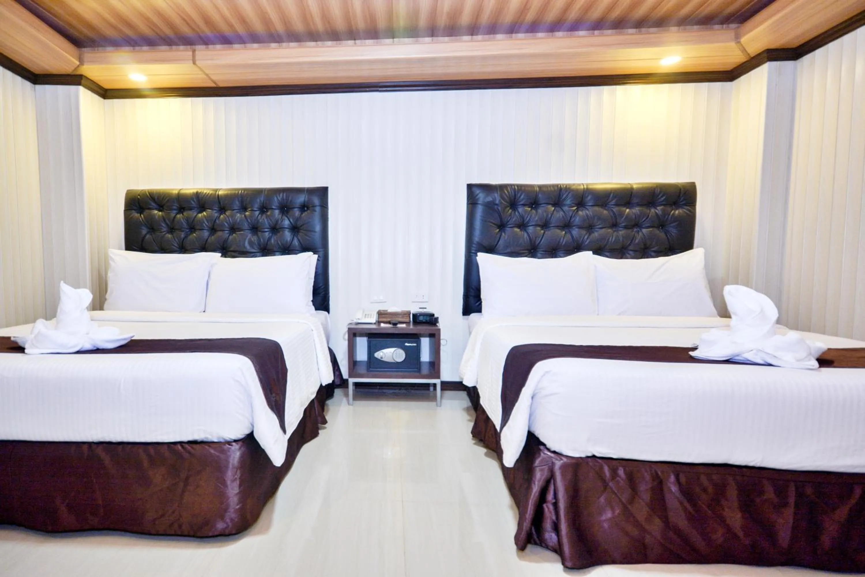 Bed in Diamond Water Edge Resort