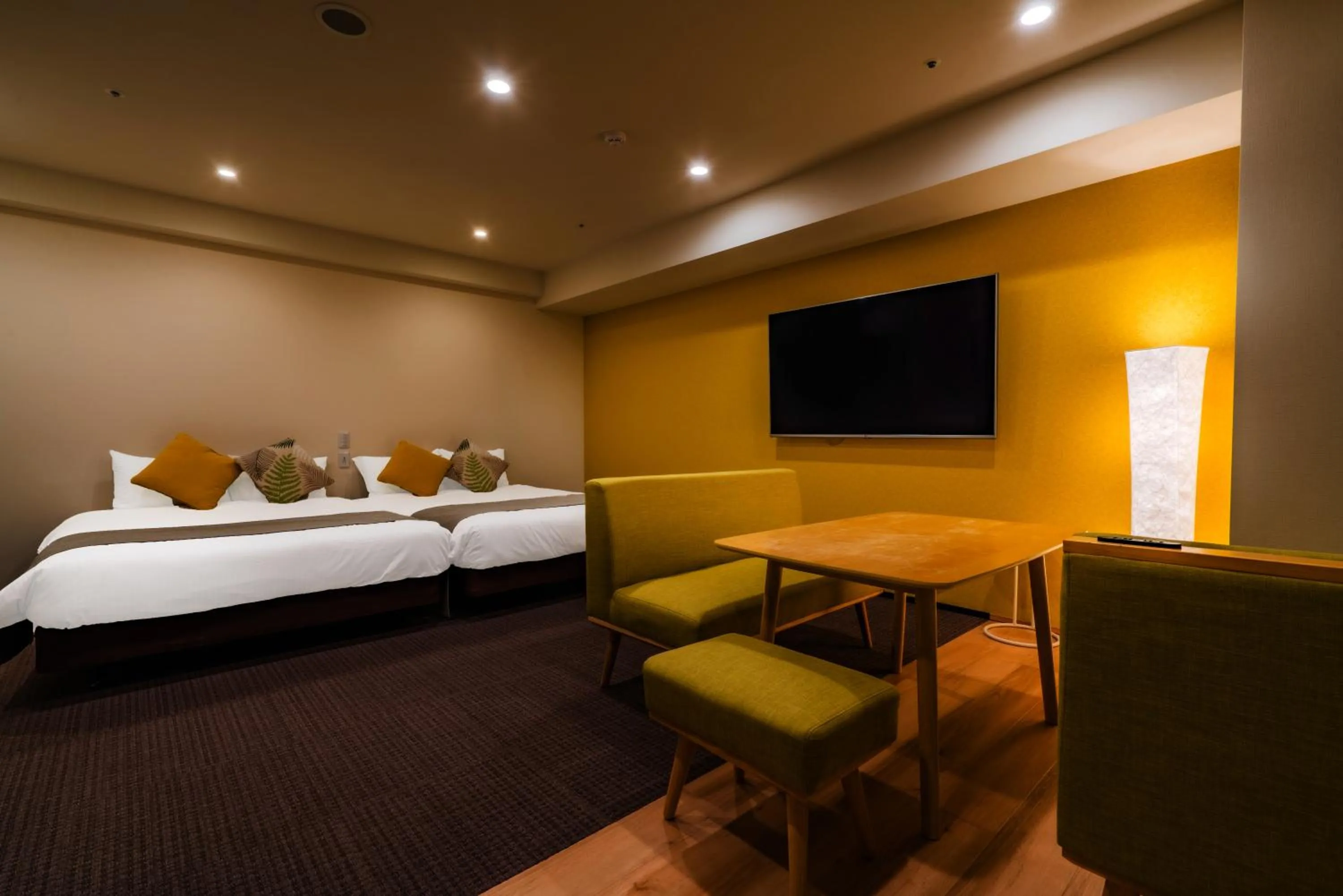 Photo of the whole room, Bed in Randor Hotel Sapporo Suites