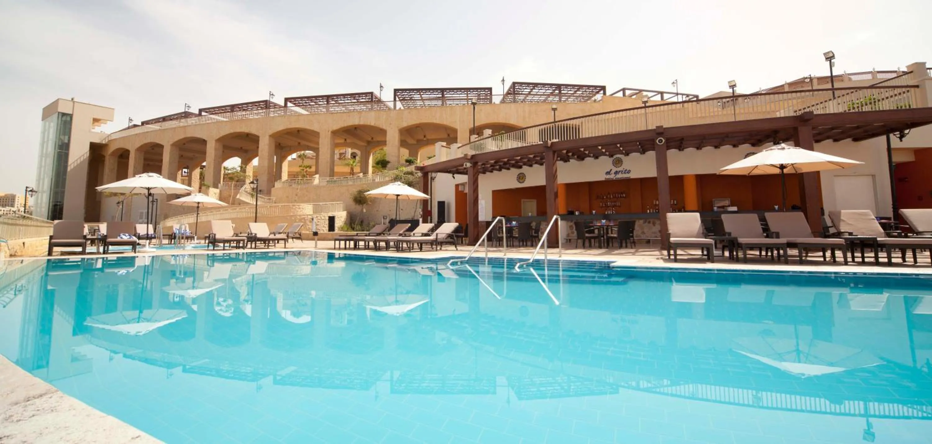 Swimming pool in Crowne Plaza Jordan Dead Sea Resort & Spa by IHG