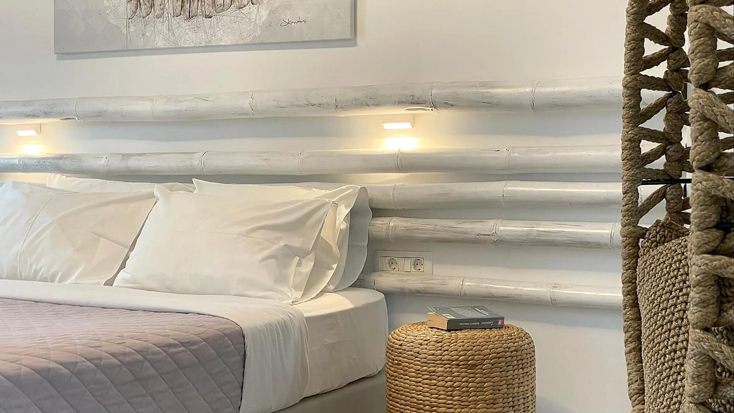 Bed in Hermoso Luxury Suites