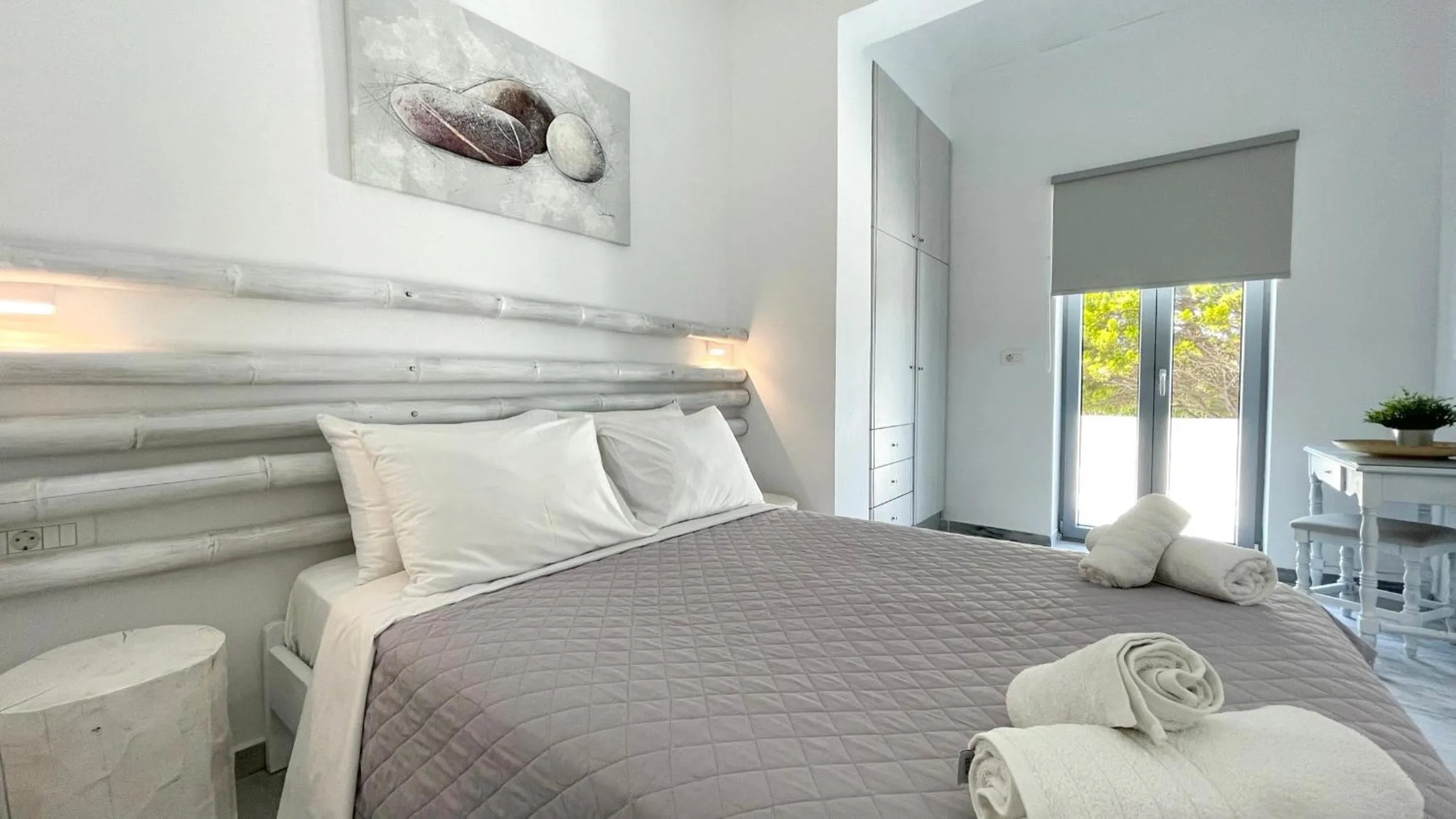 Bed in Hermoso Luxury Suites