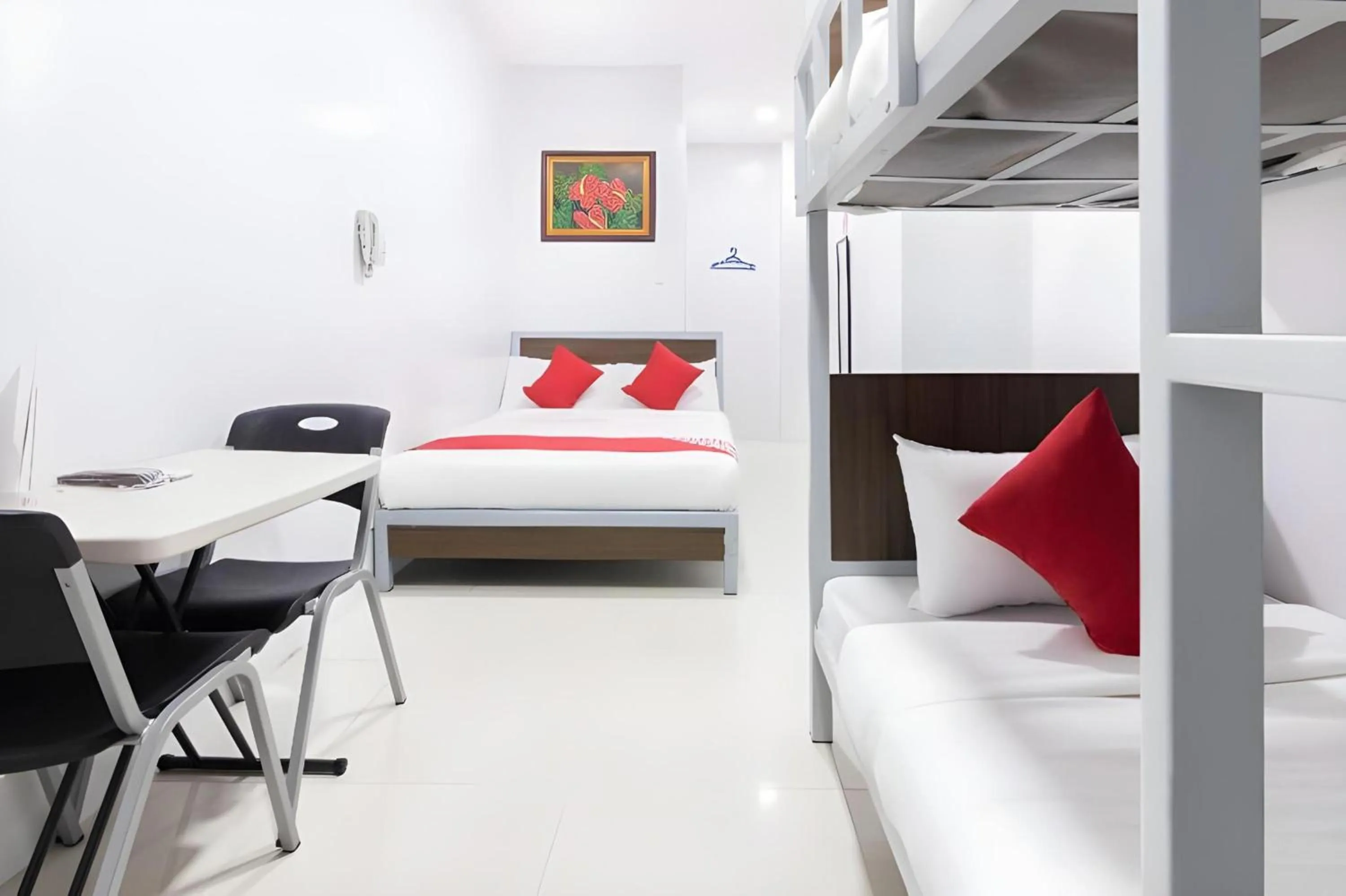 Bedroom, Bed in OYO 152 Sangco Condotel