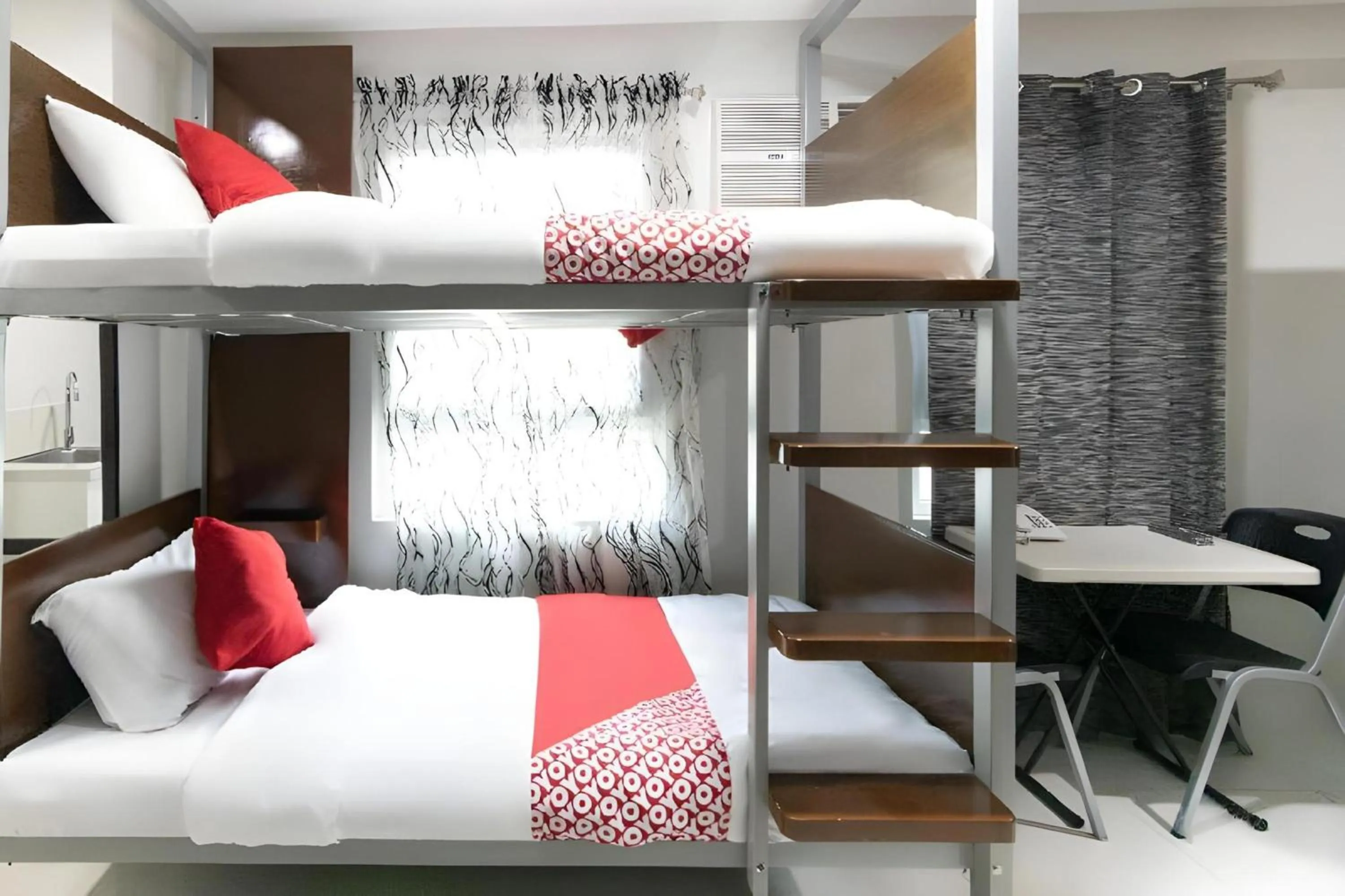 Bedroom, Bed in OYO 152 Sangco Condotel