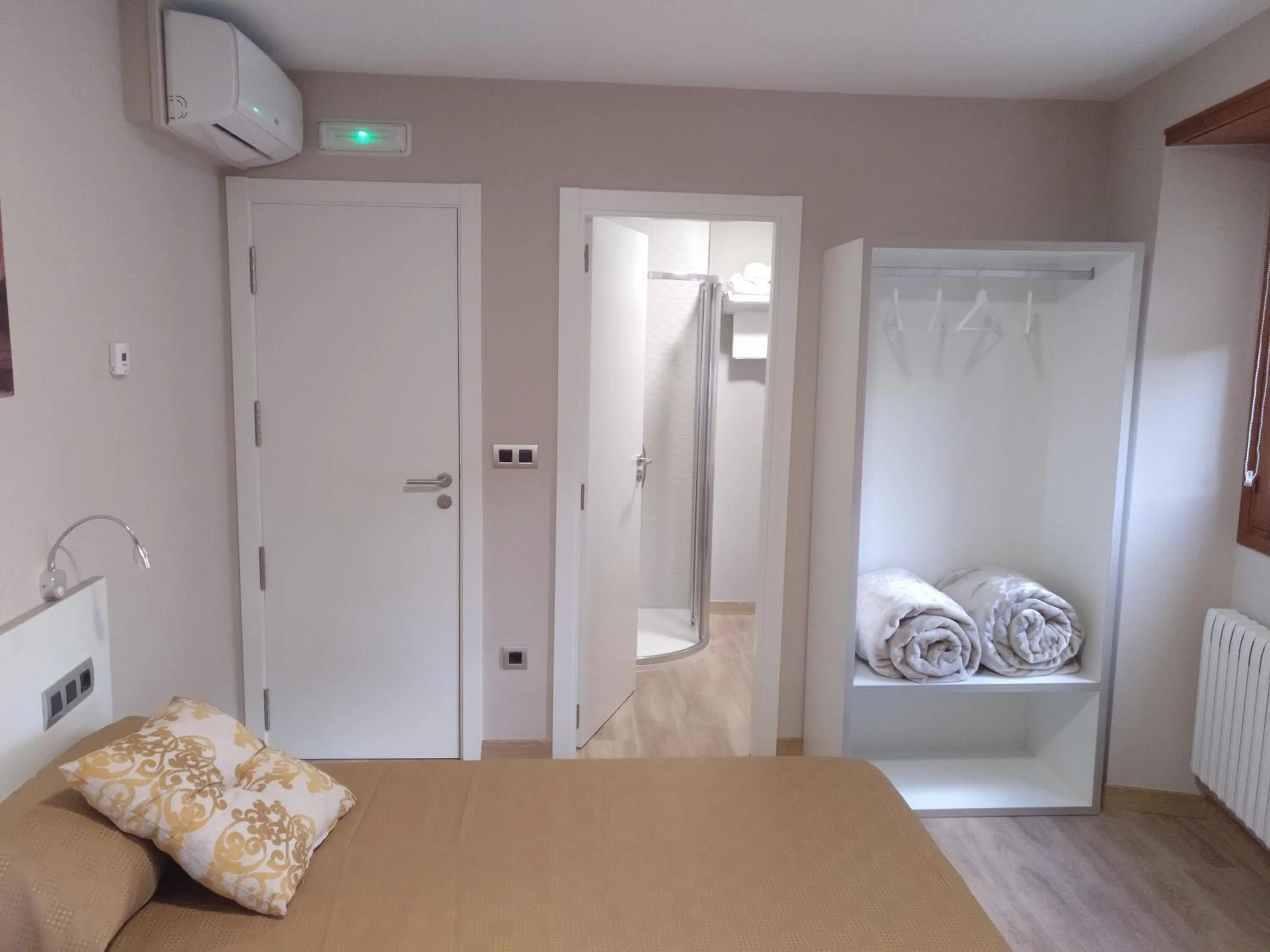 Bed in Travesia Rooms