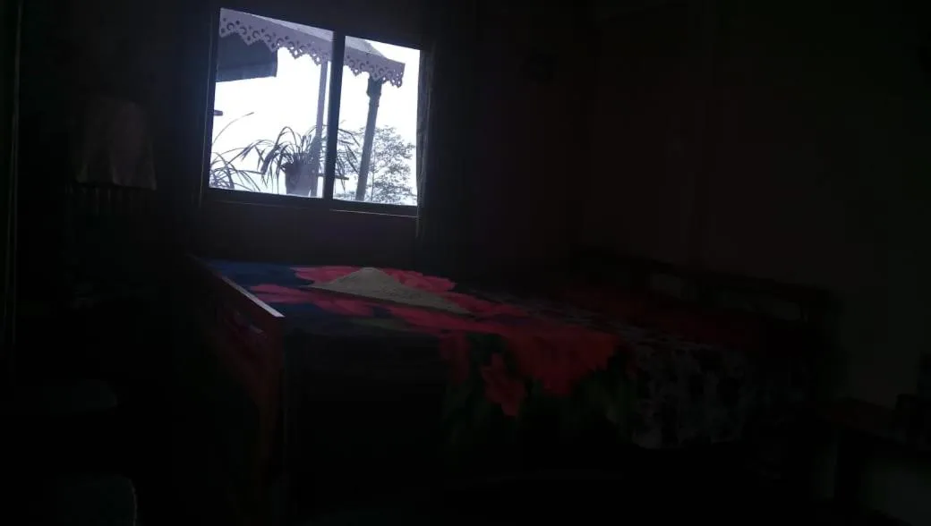 Bed in Sinkawli Homestay