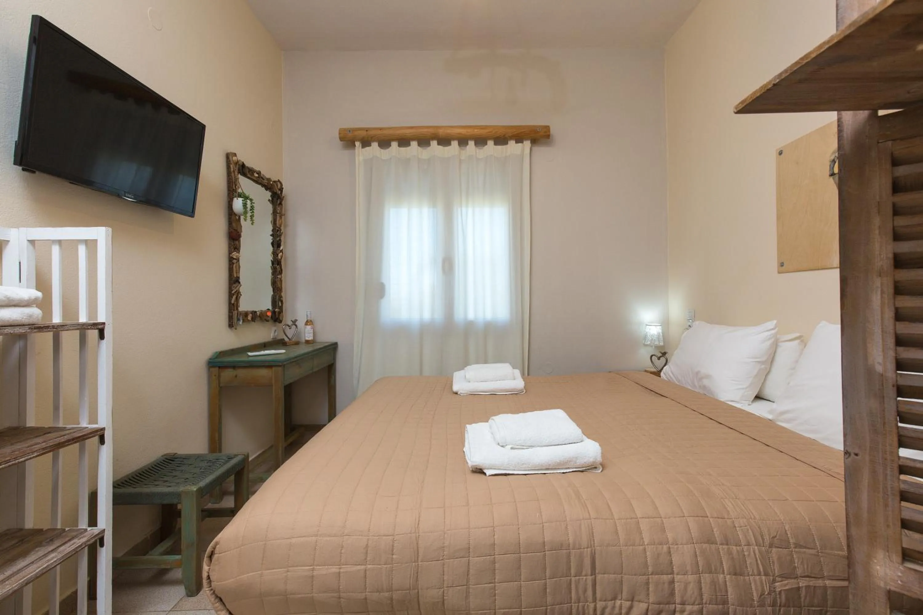 Bed in Arodamos Studios & Apts