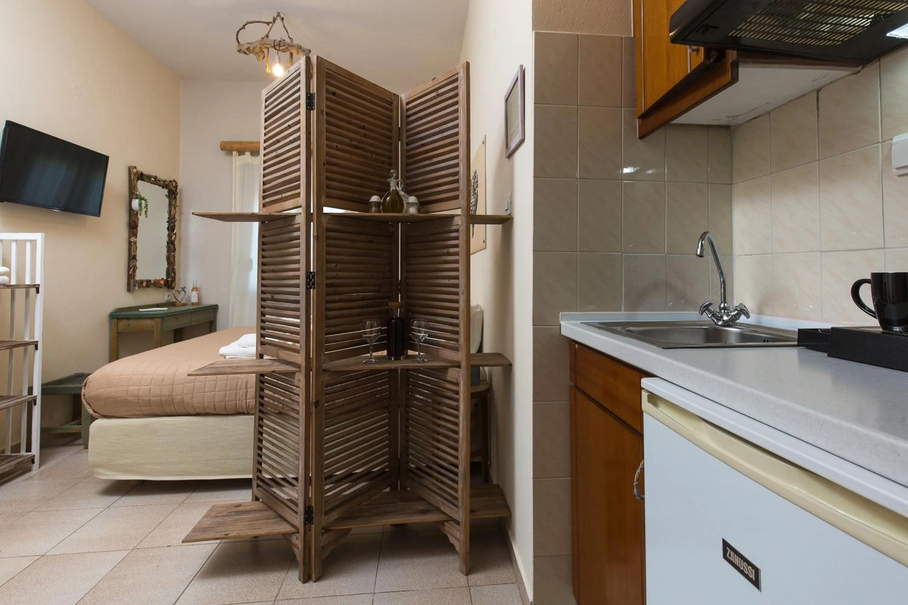 stove, Bed in Arodamos Studios & Apts