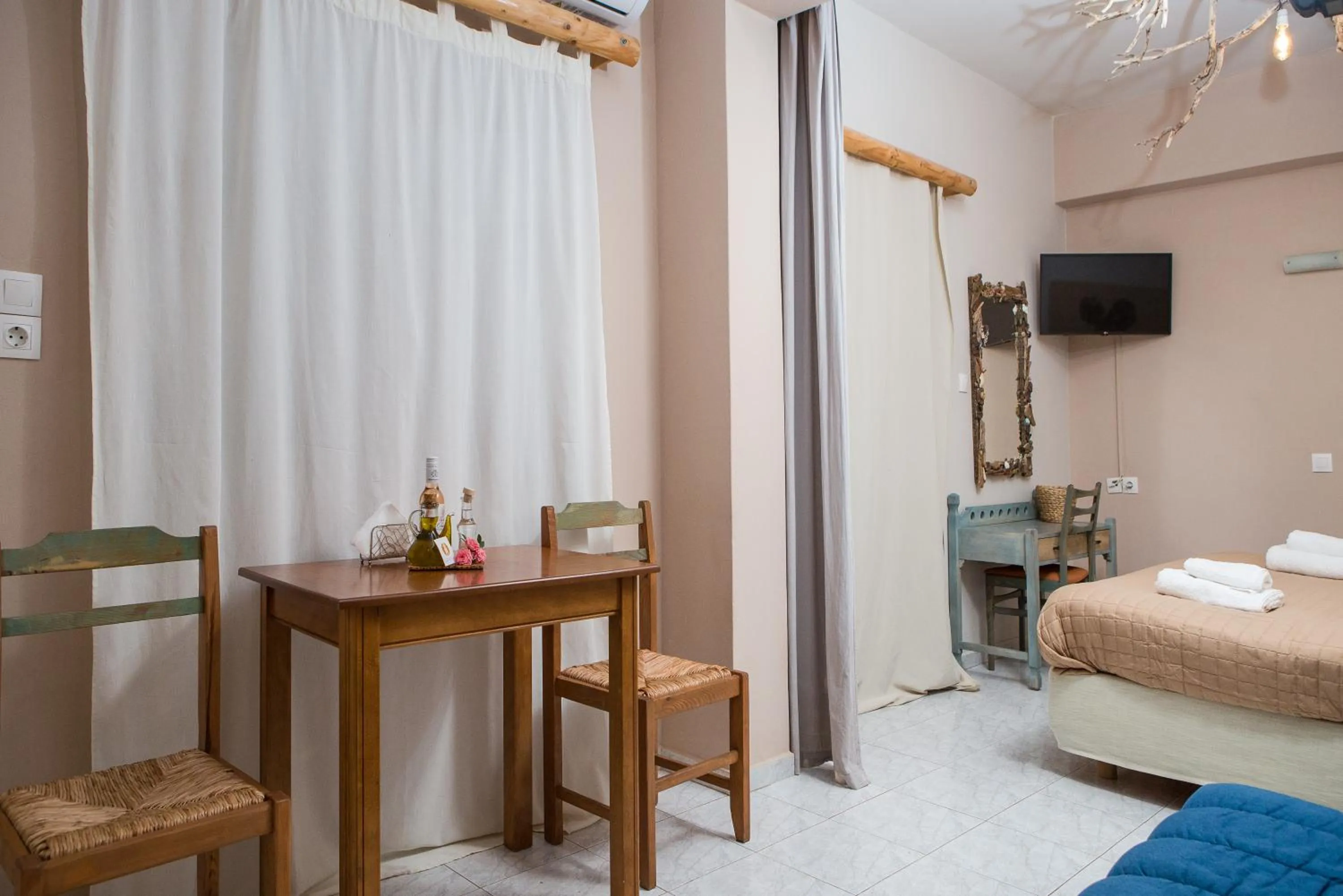 Bed in Arodamos Studios & Apts