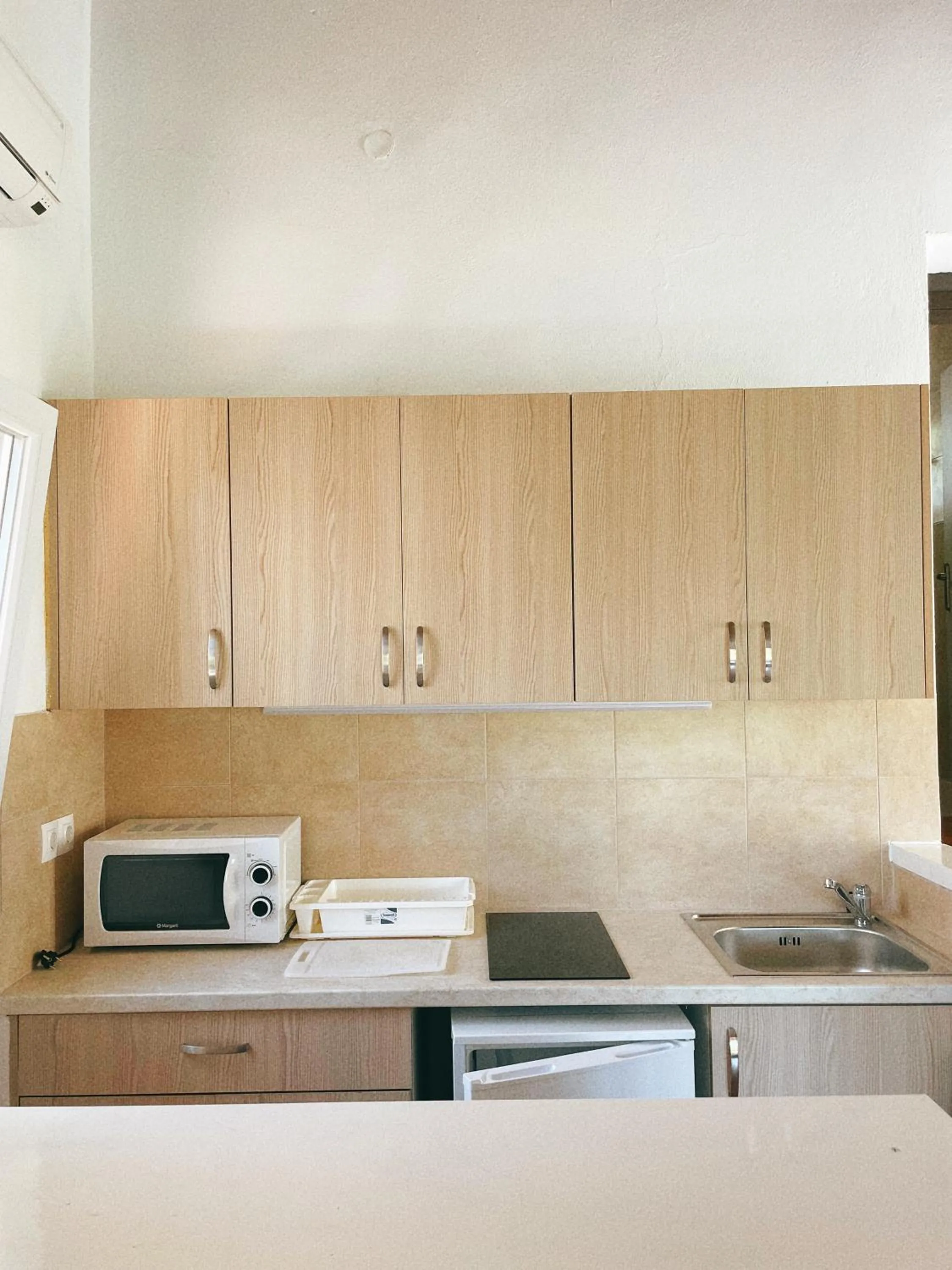 Kitchen or kitchenette in Villa Elpiniki