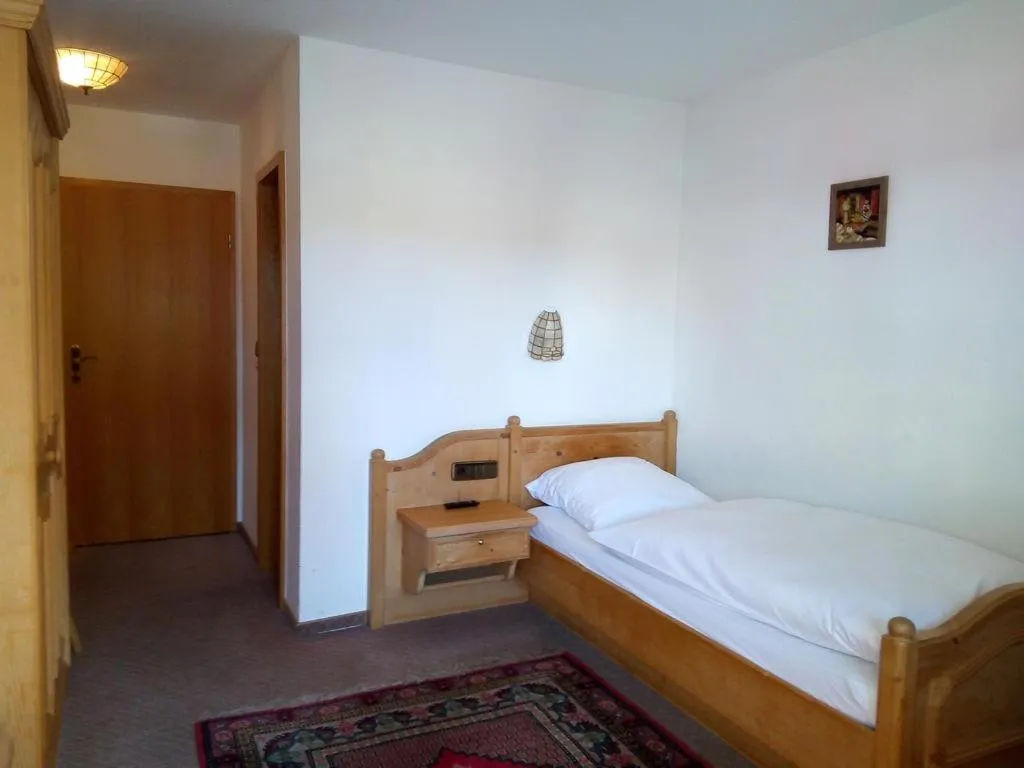 Photo of the whole room, Bed in Gästehaus Rössle