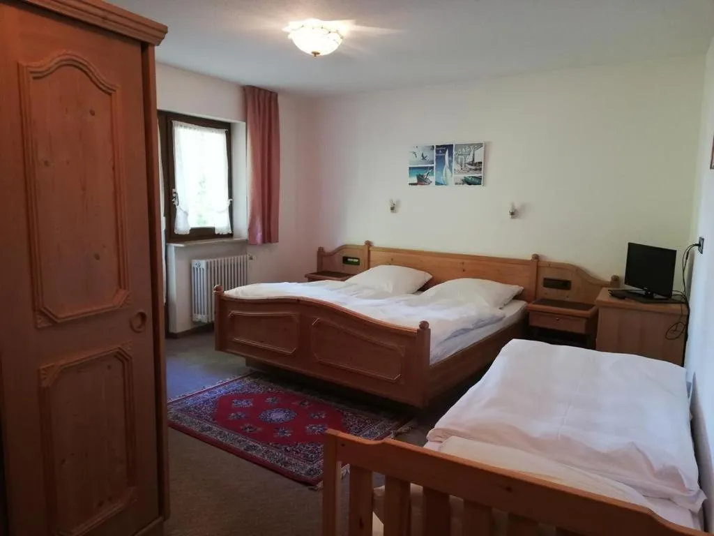 Photo of the whole room, Bed in Gästehaus Rössle