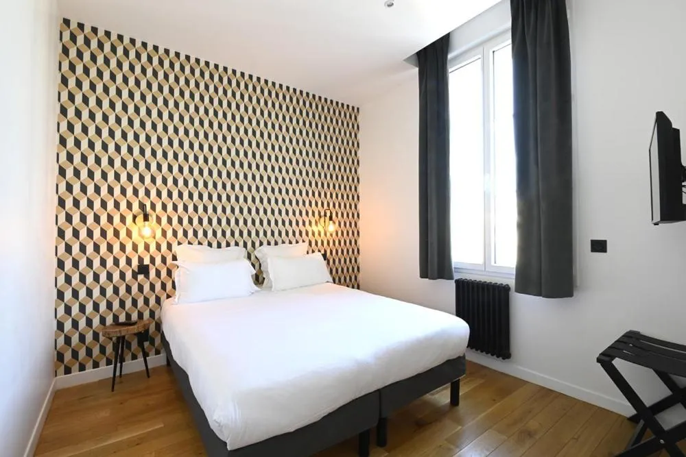 Bed in Manoir de l'évêché et Spa