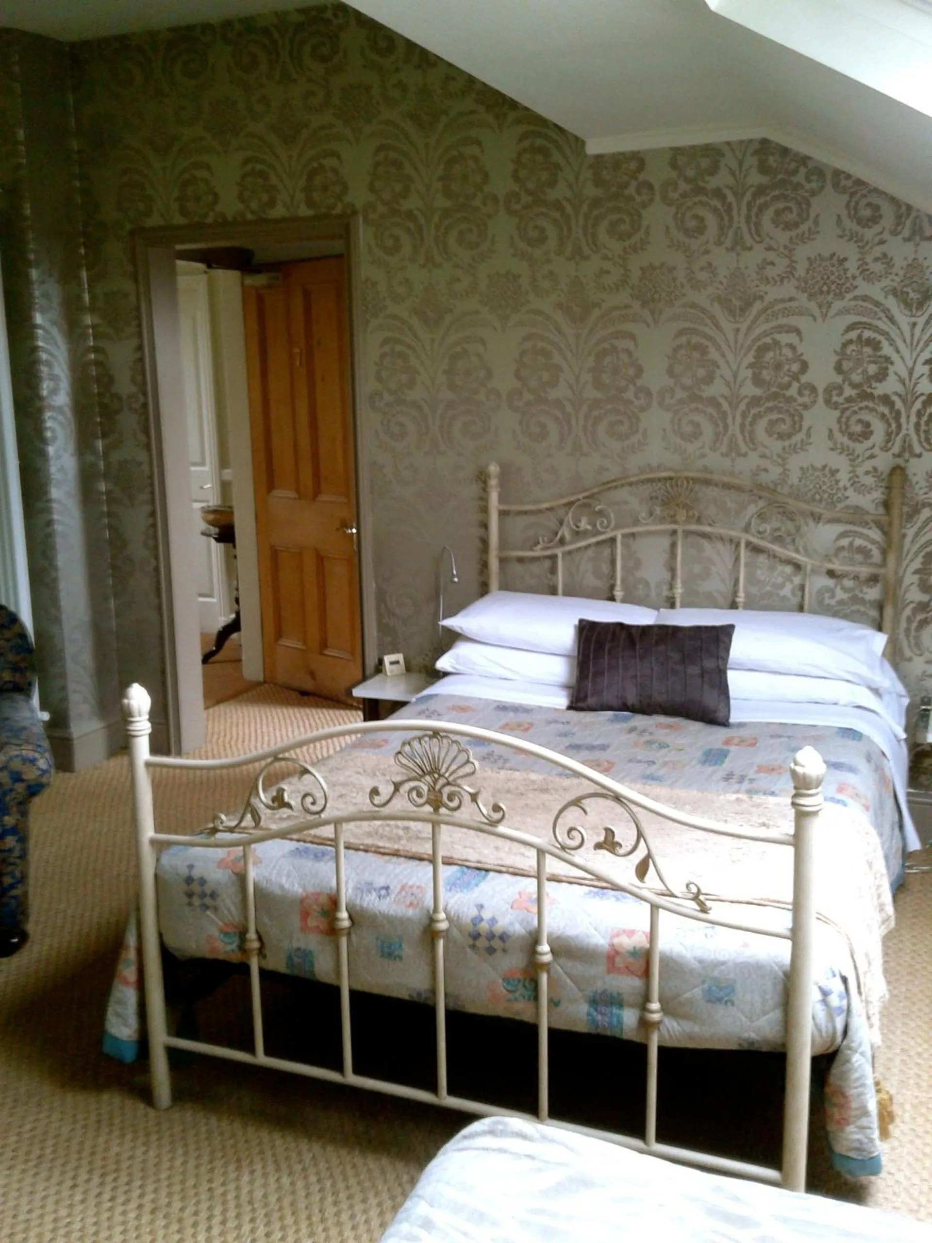 Bedroom, Bed in OYO Cornerstone Manor Hotel