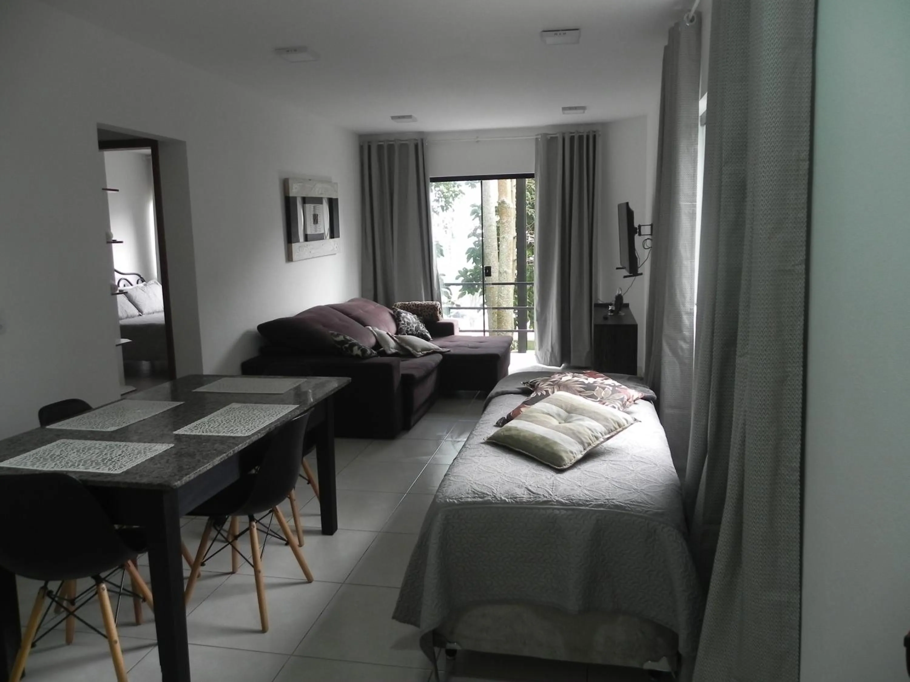 Living room, Bed in Aconchego Serra Imperial