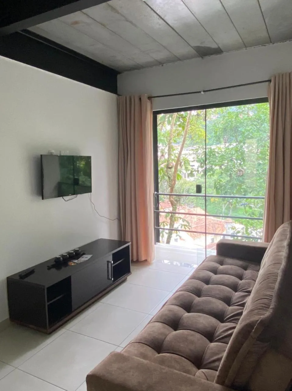 Living room in Aconchego Serra Imperial