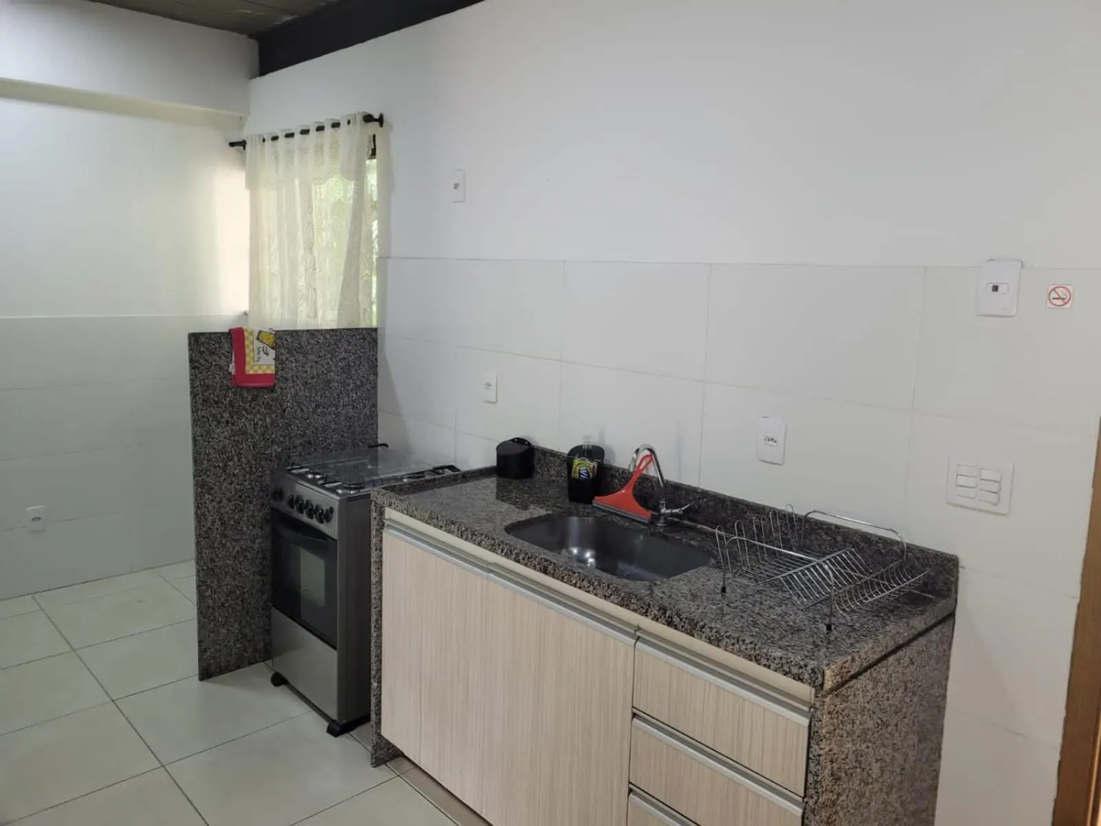 Communal kitchen in Aconchego Serra Imperial