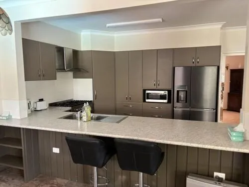 Kitchen or kitchenette in Bridge Motel Wellington