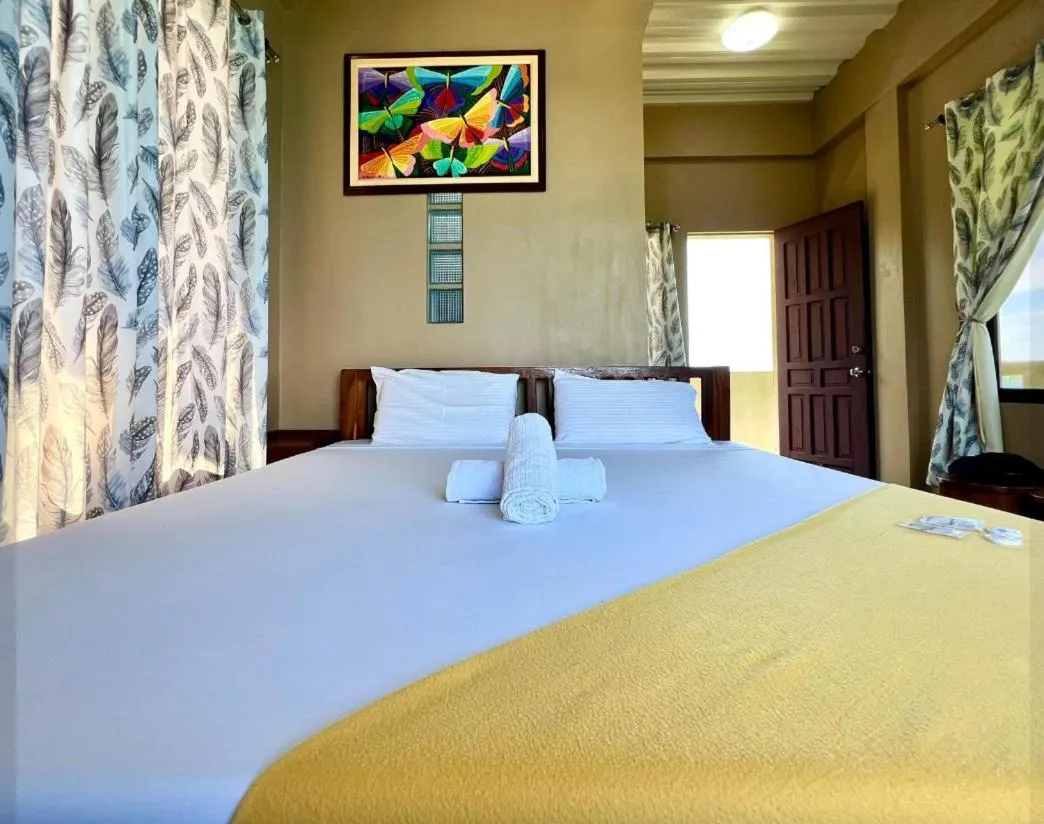 Bed in Oceanfront Beach Resort