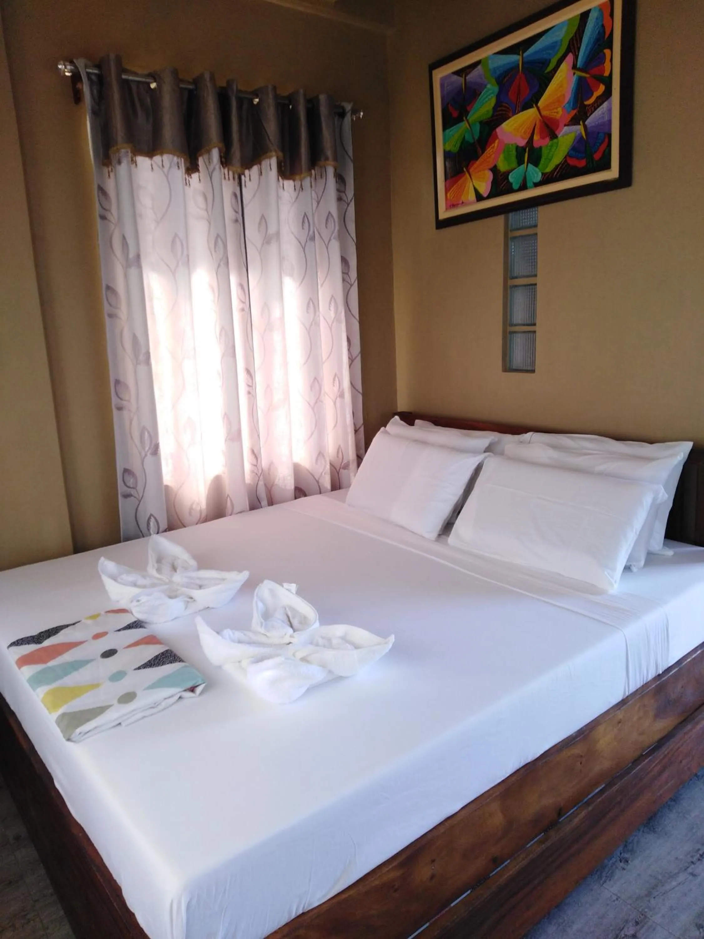 Bed in Oceanfront Beach Resort