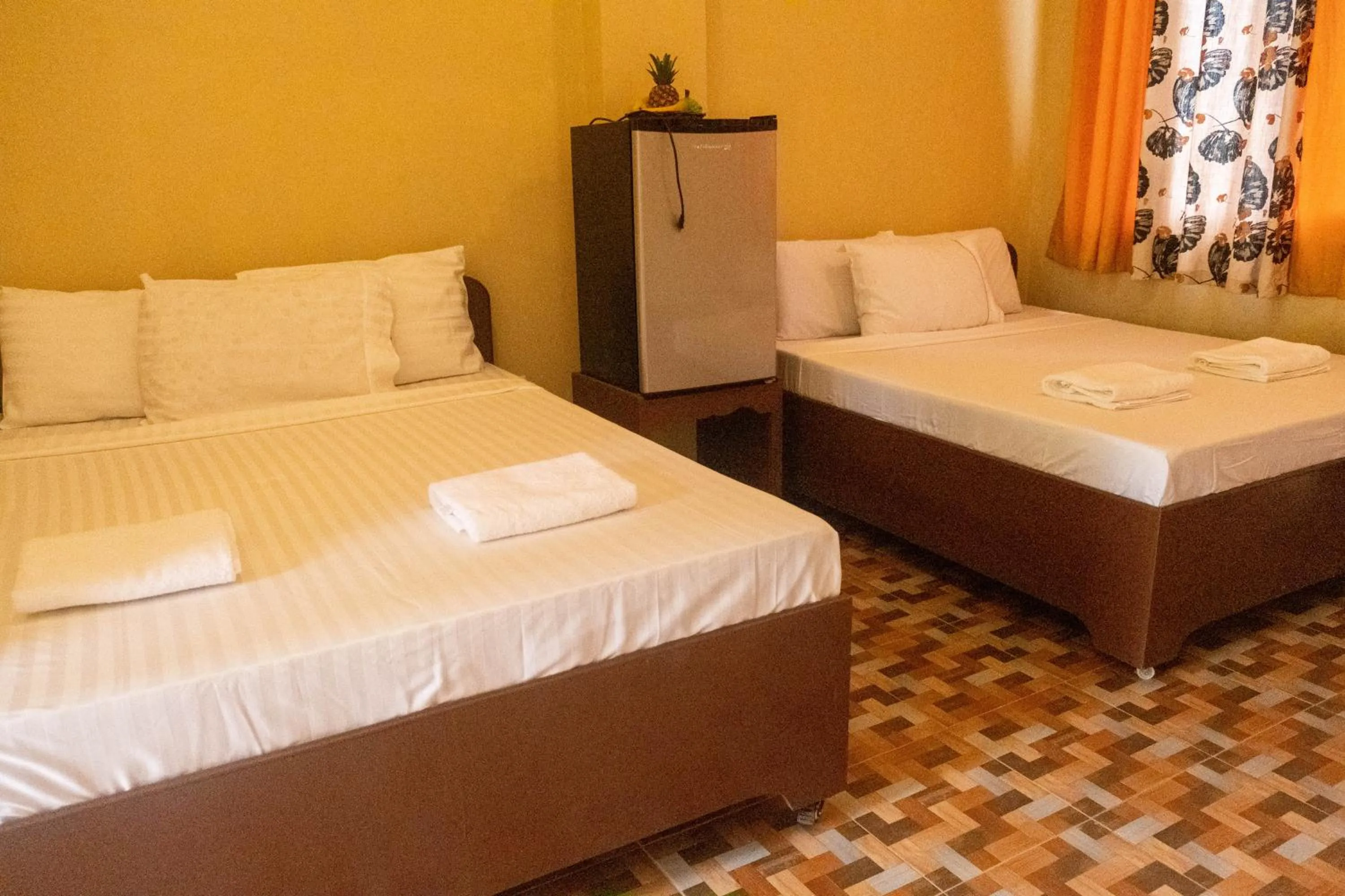 Bed in Oceanfront Beach Resort