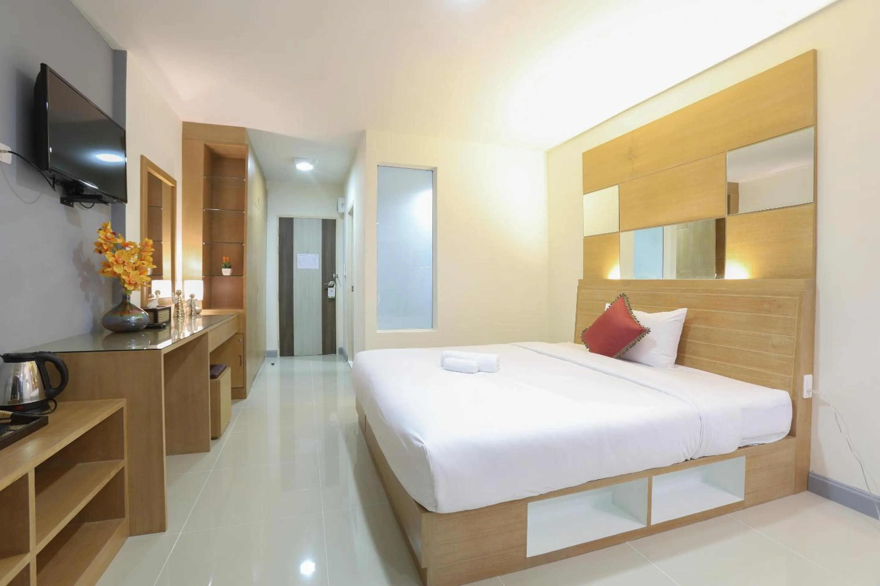 Bed in The Greenery central suite & hotel