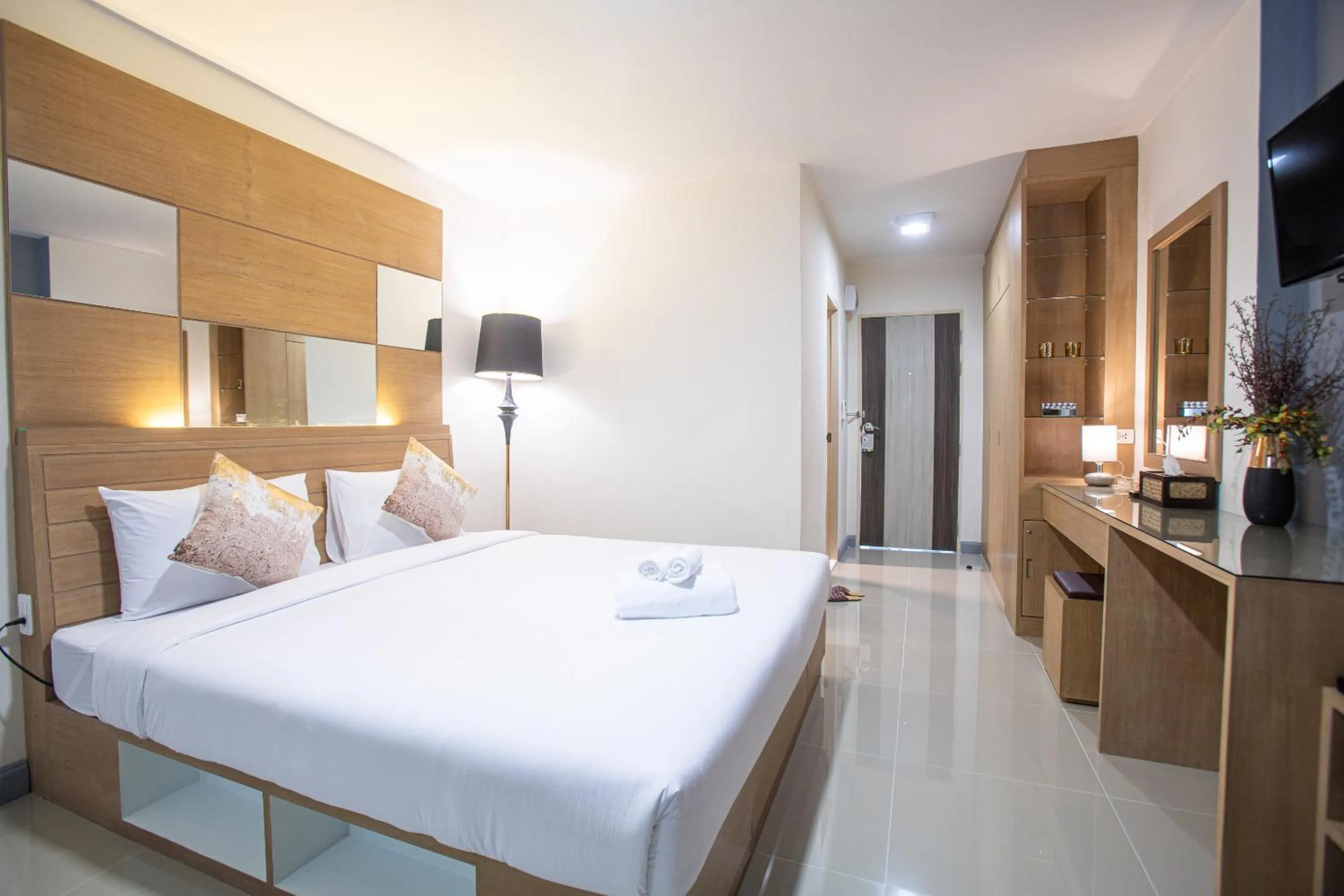 Bed in The Greenery central suite & hotel