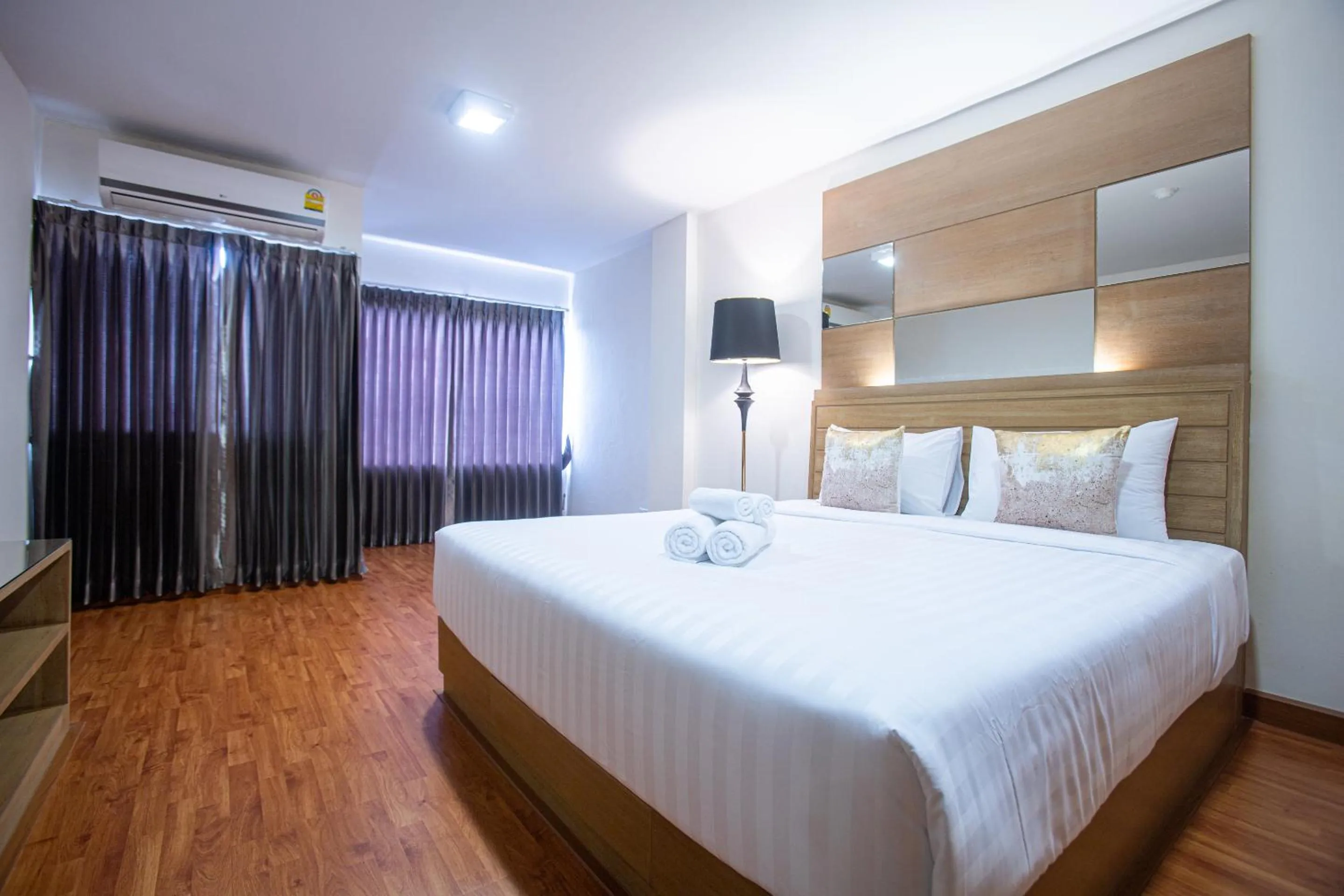 Bed in The Greenery central suite & hotel