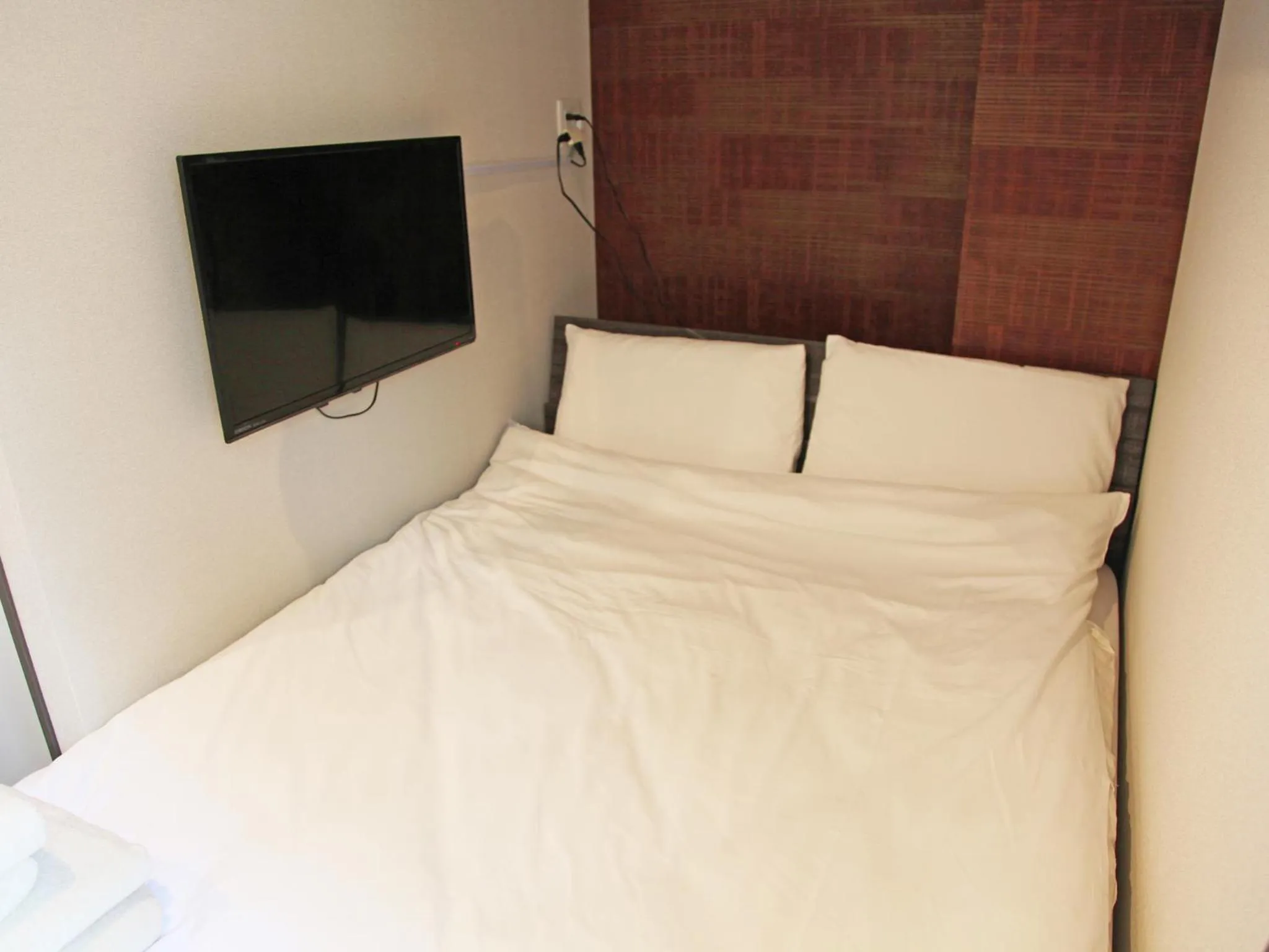 Bedroom, Bed in Okinawa City Hotel