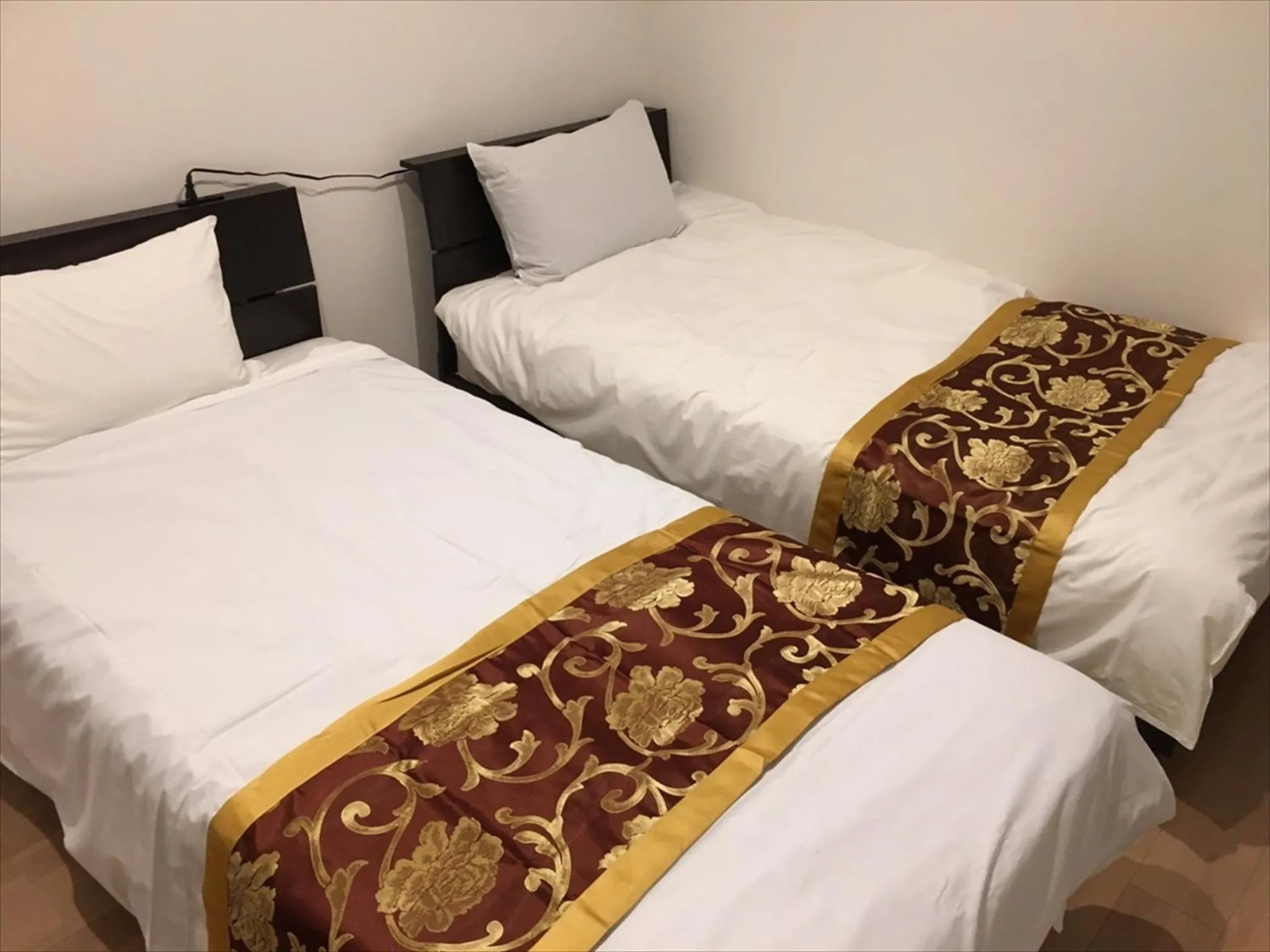 Bed in Okinawa City Hotel