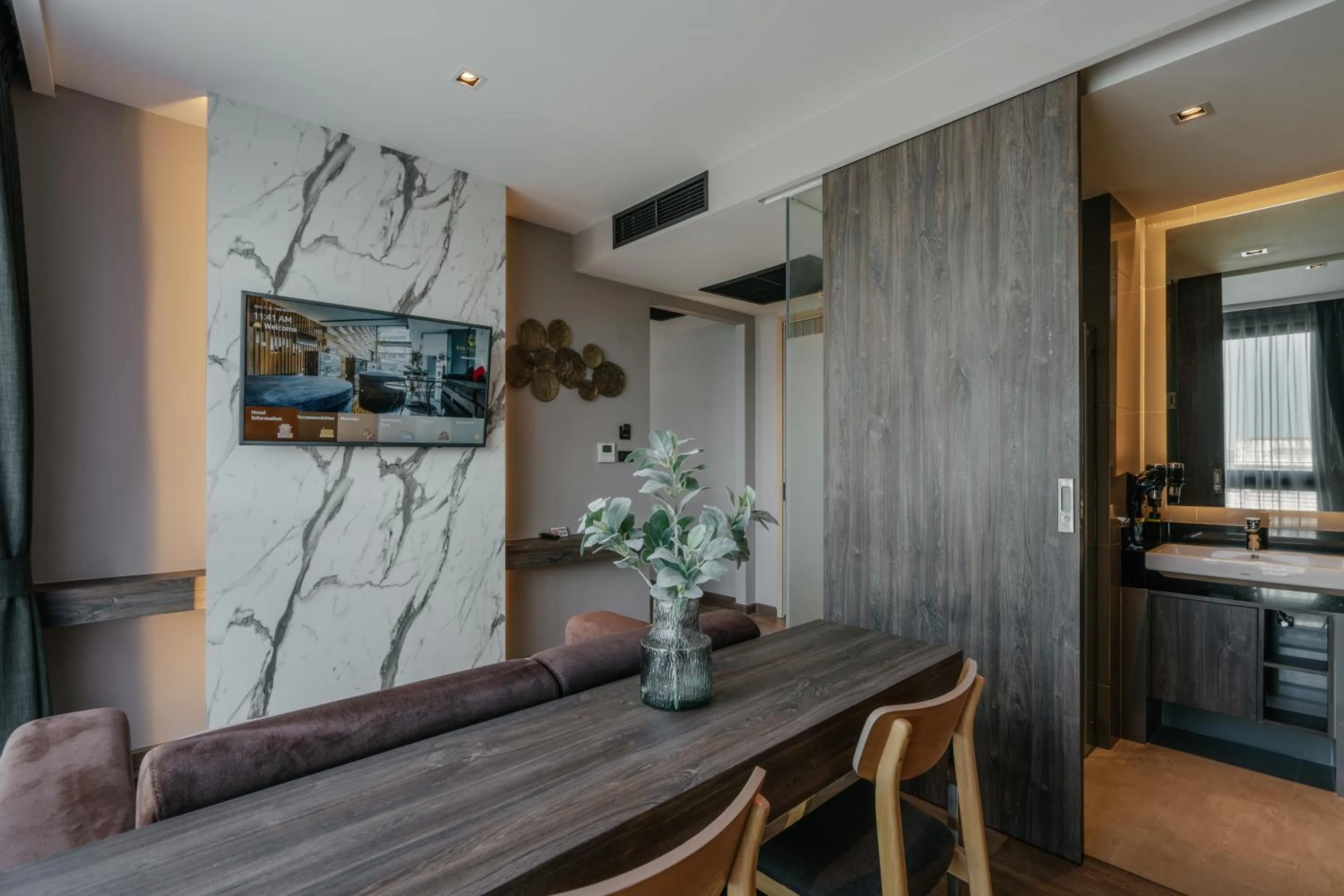 Living room in Rak Elegant Hotel Patong