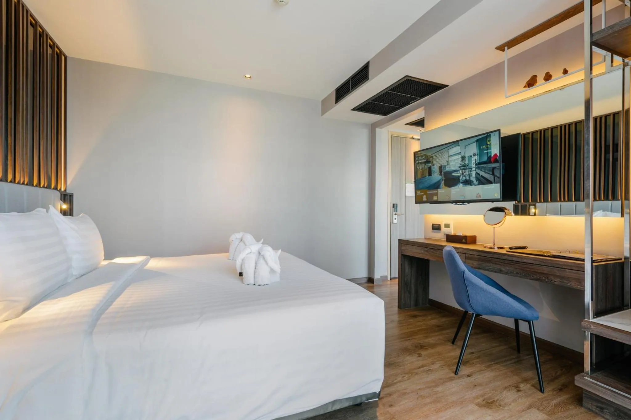 Bed in Rak Elegant Hotel Patong