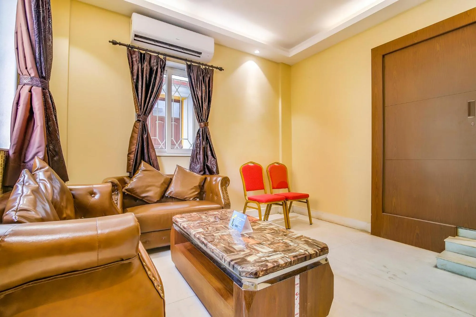 Seating area in FabHotel Luxor - Nr Acropolis Mall