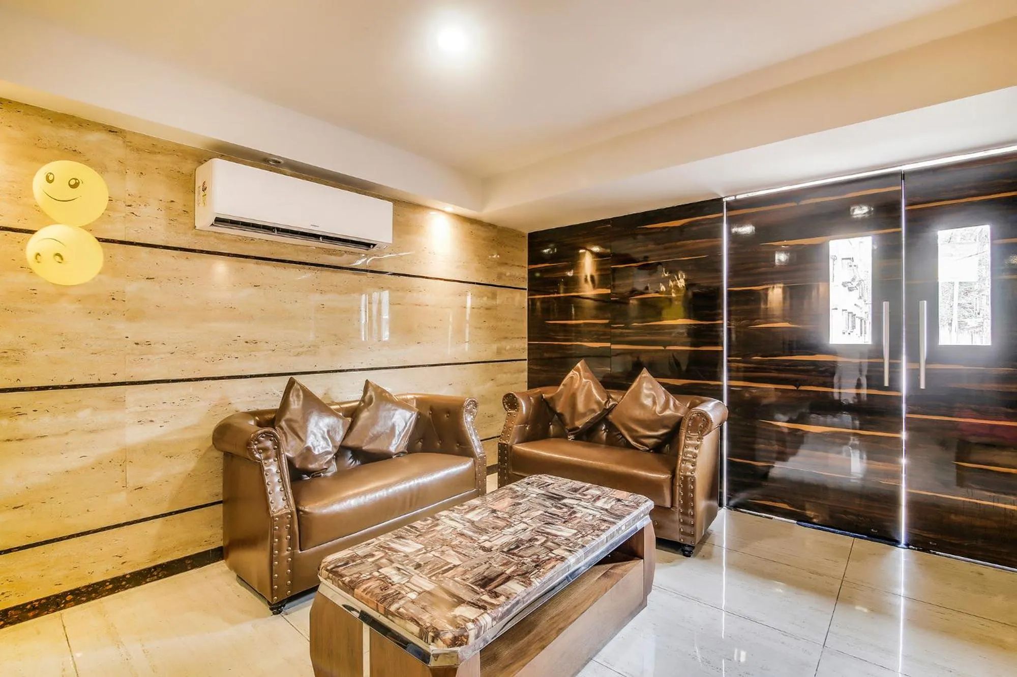 Seating area in FabHotel Luxor - Nr Acropolis Mall