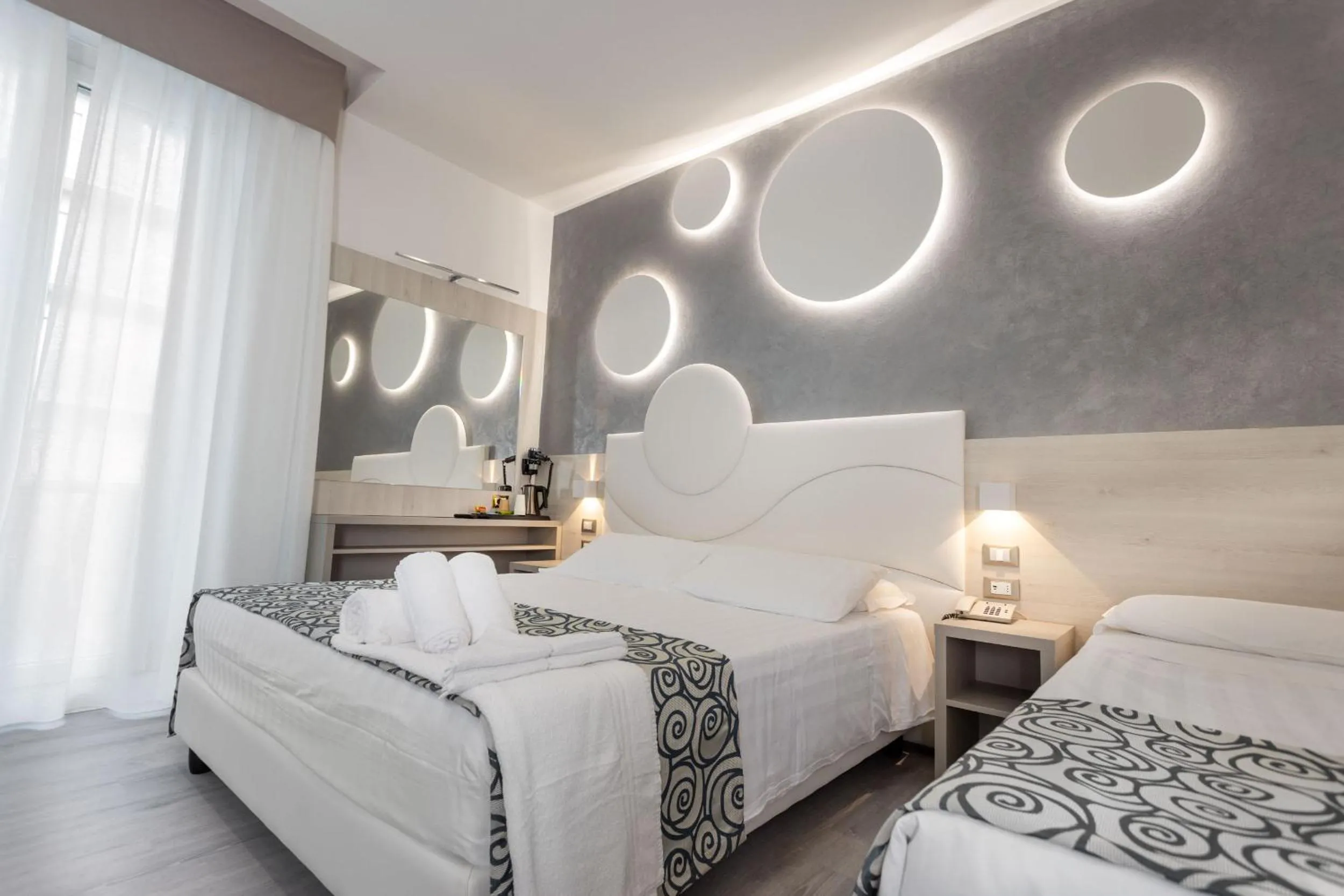Bed in Hotel Nettuno