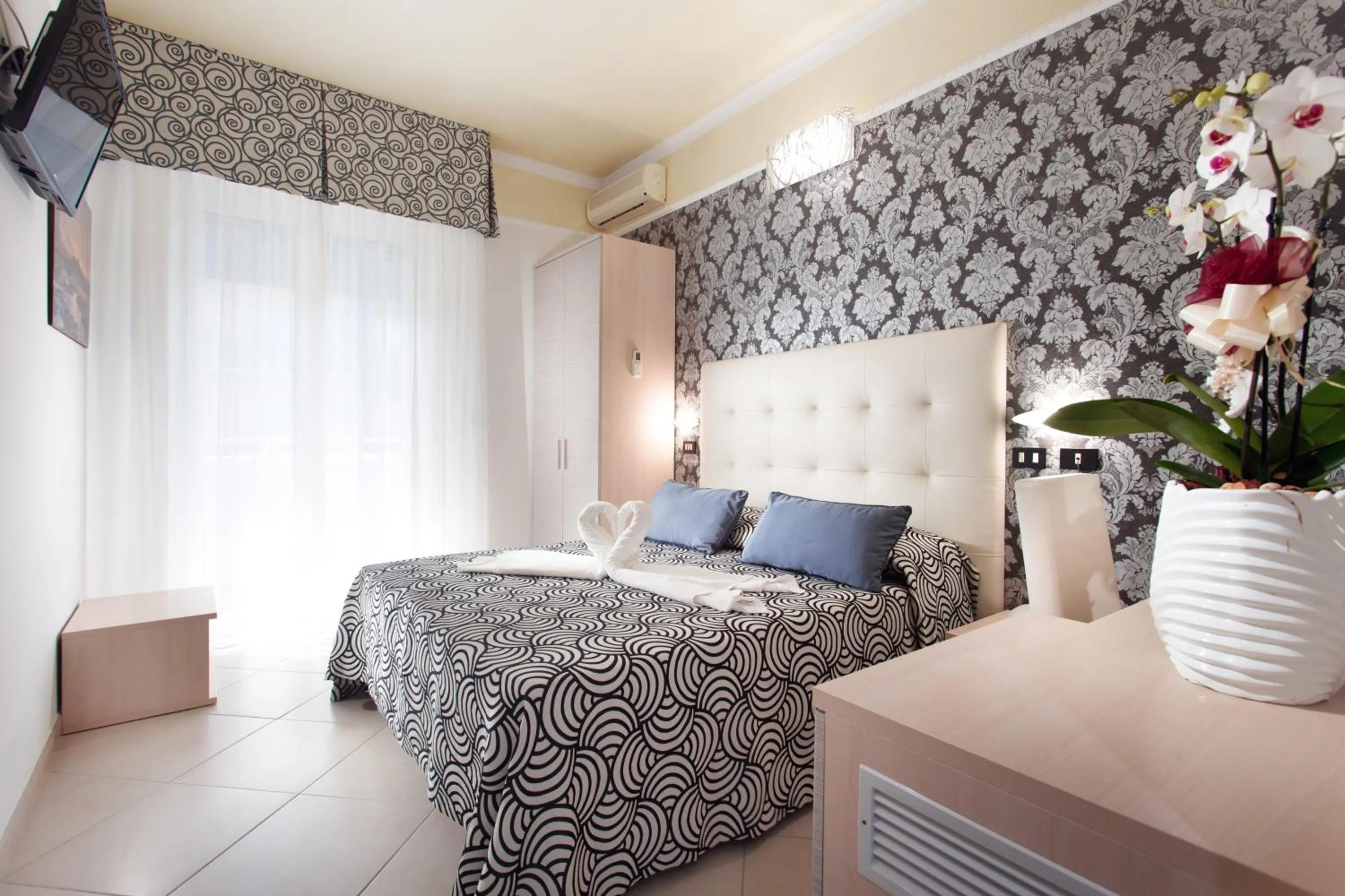 Bed in Hotel Nettuno