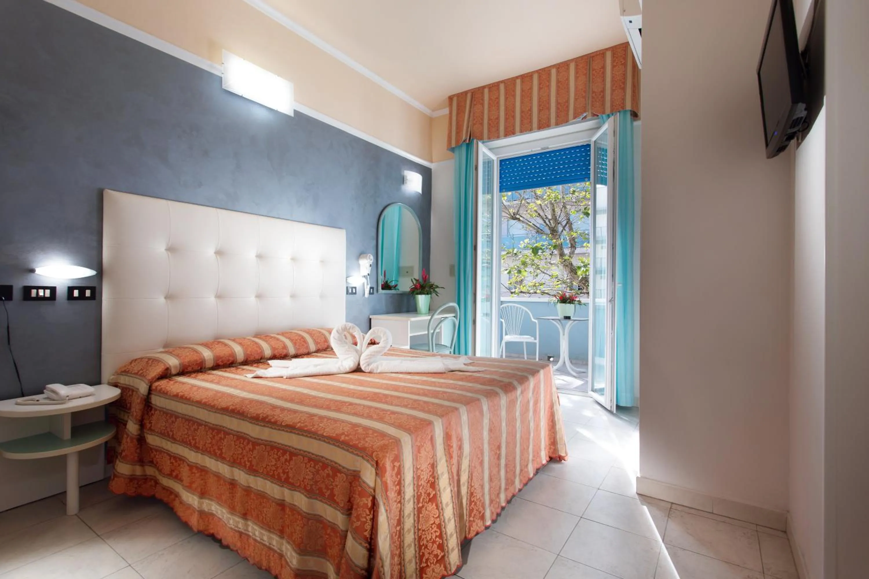 Bed in Hotel Nettuno