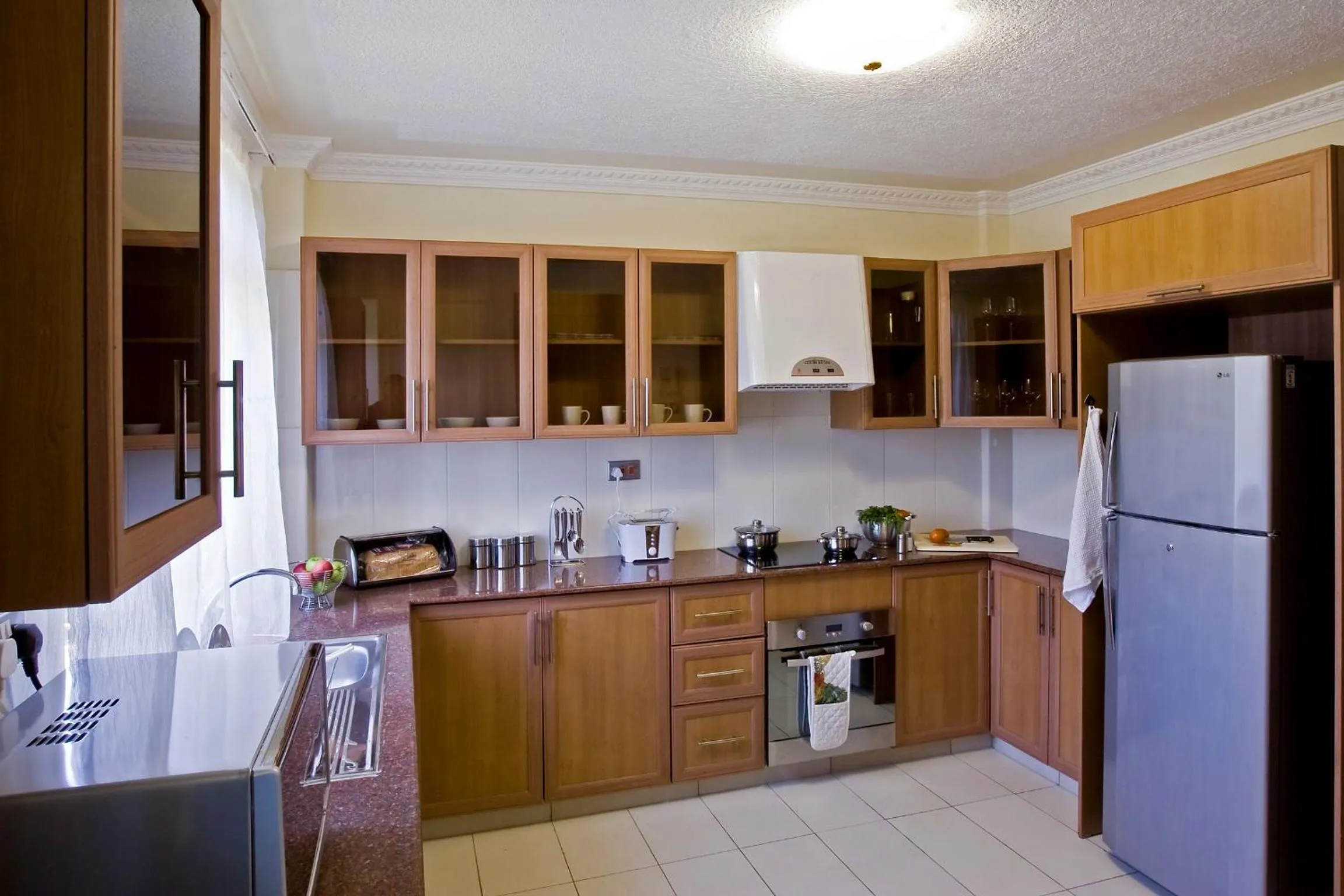 Kitchen or kitchenette in GemSuites Serviced Apartments State House