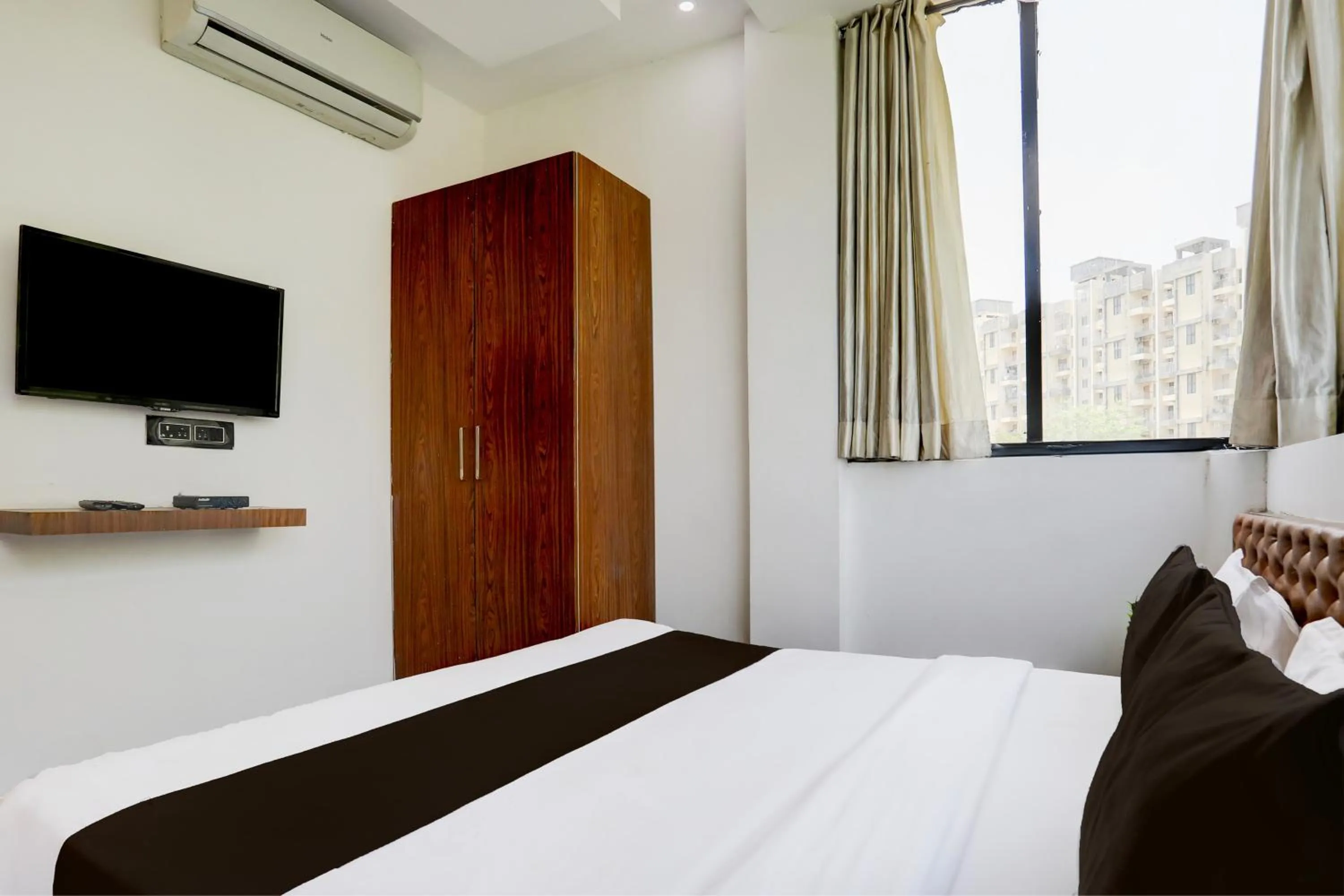 Bedroom, Bed in Hotel O MP Nagar Near Rachna Tower