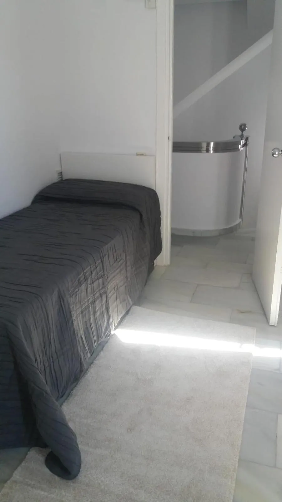 Bed in Marbella House Penthouse