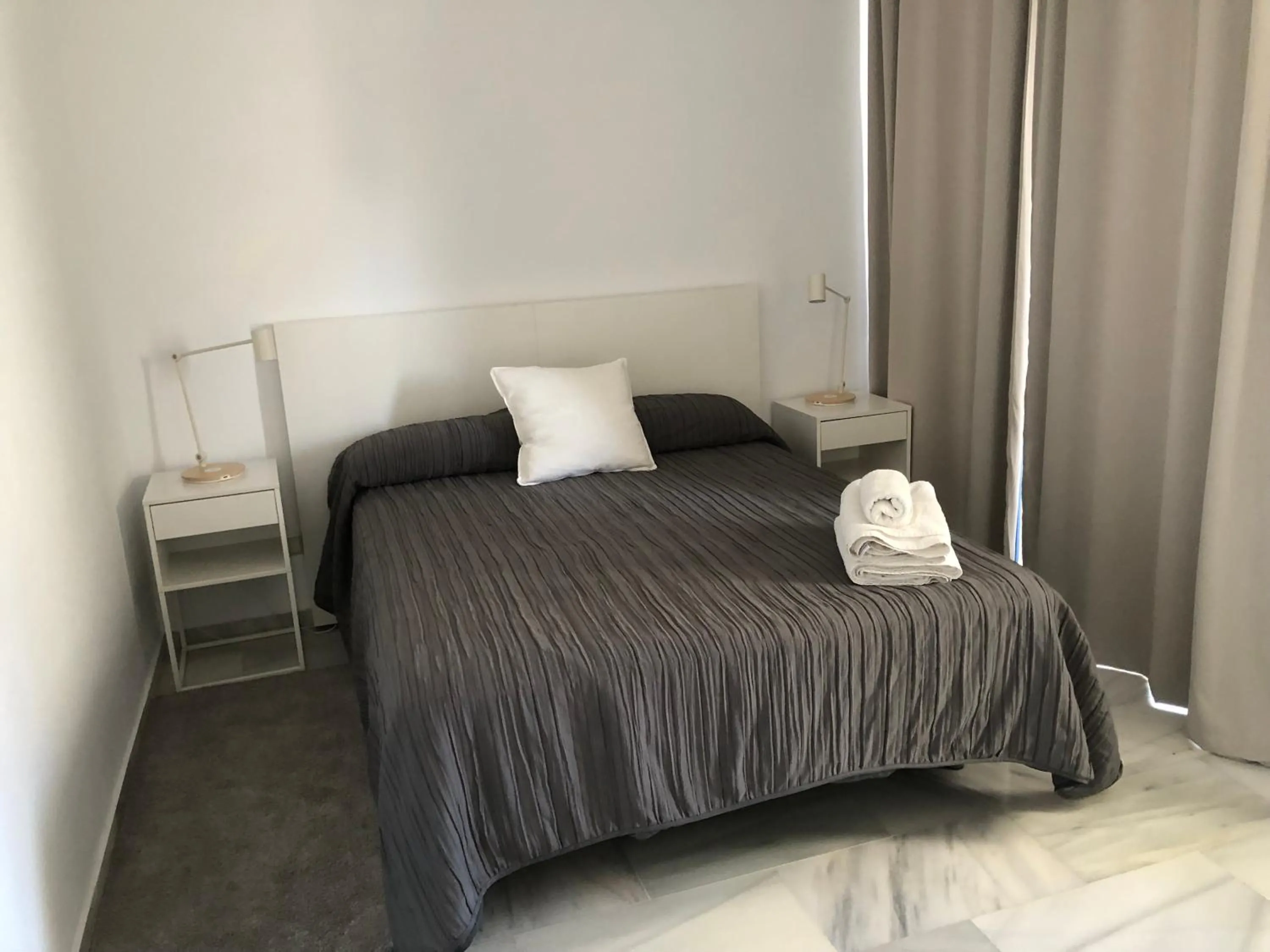 Bed in Marbella House Penthouse