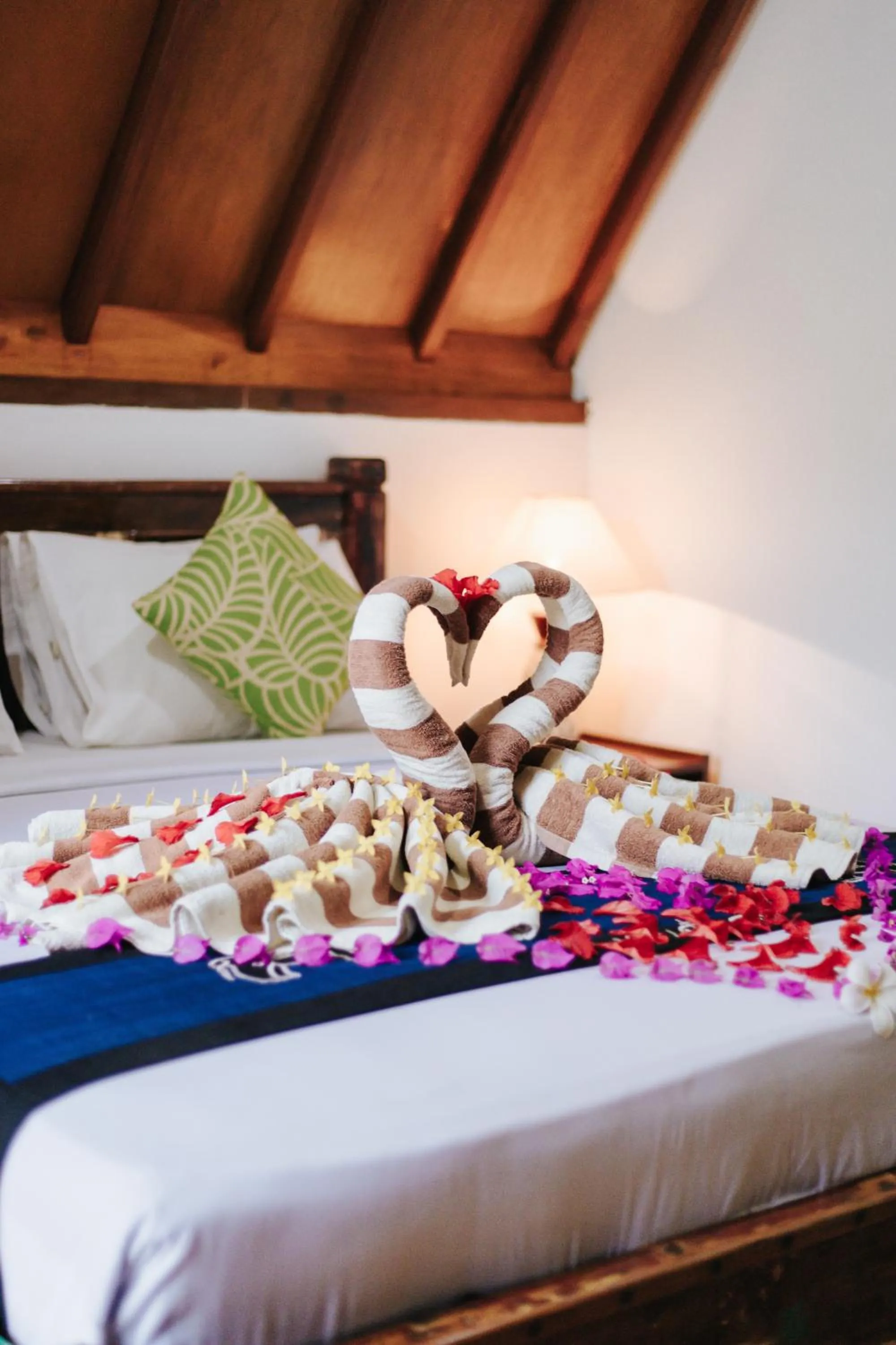 Bed in Lucy's Garden Hotel