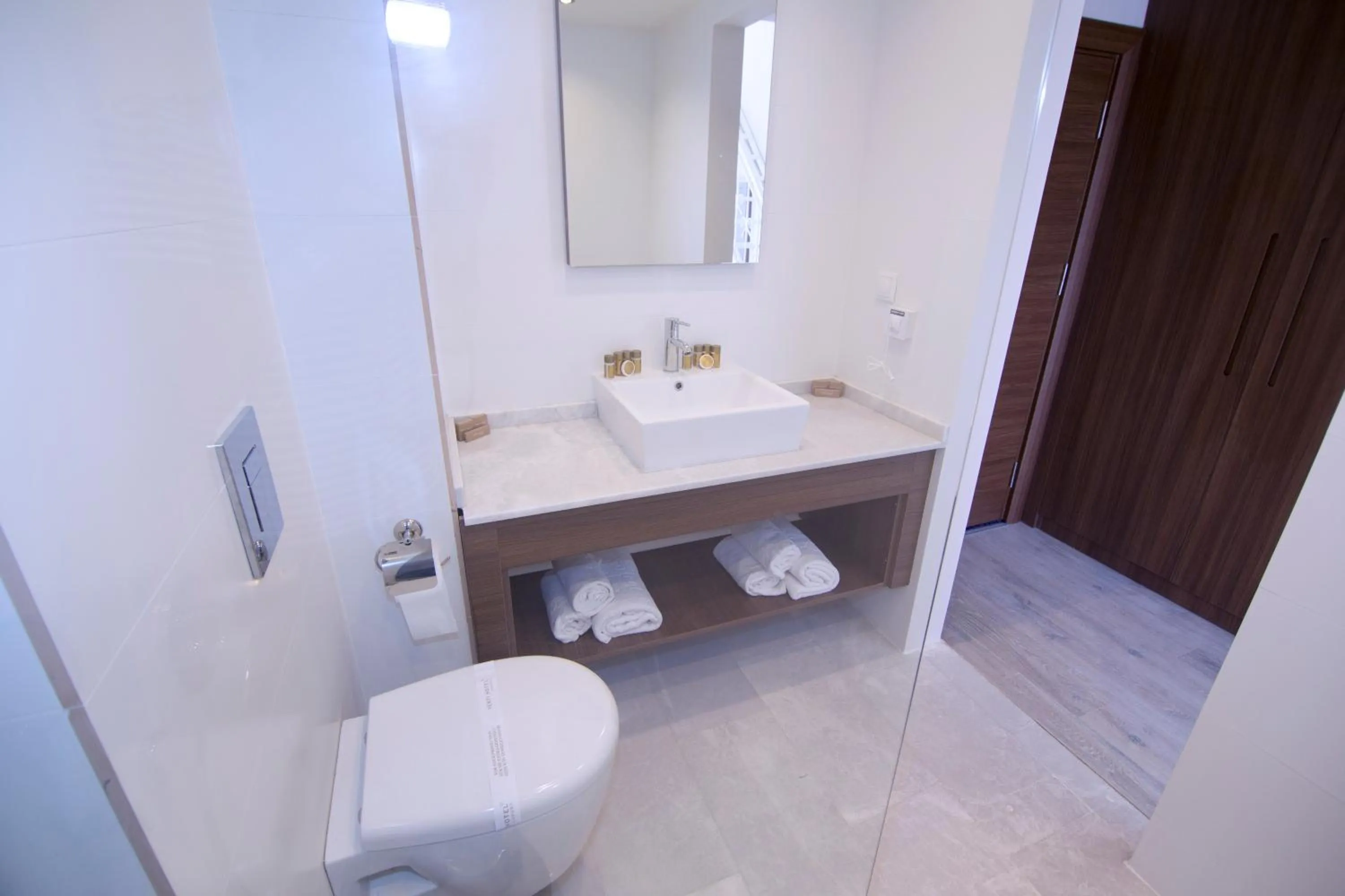 Toilet in Neopol Hotel