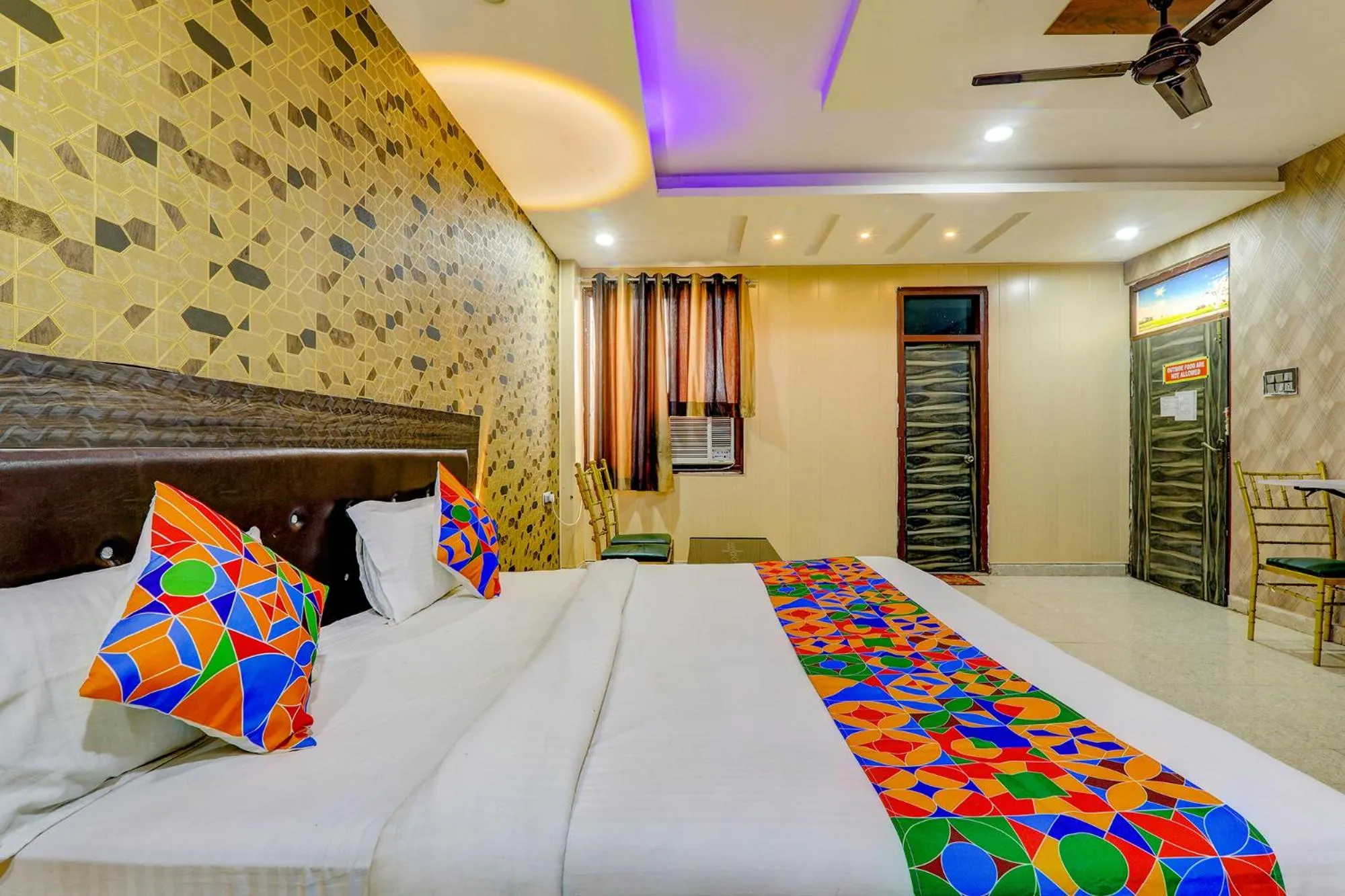 Bed in FabHotel Gold Galaxy