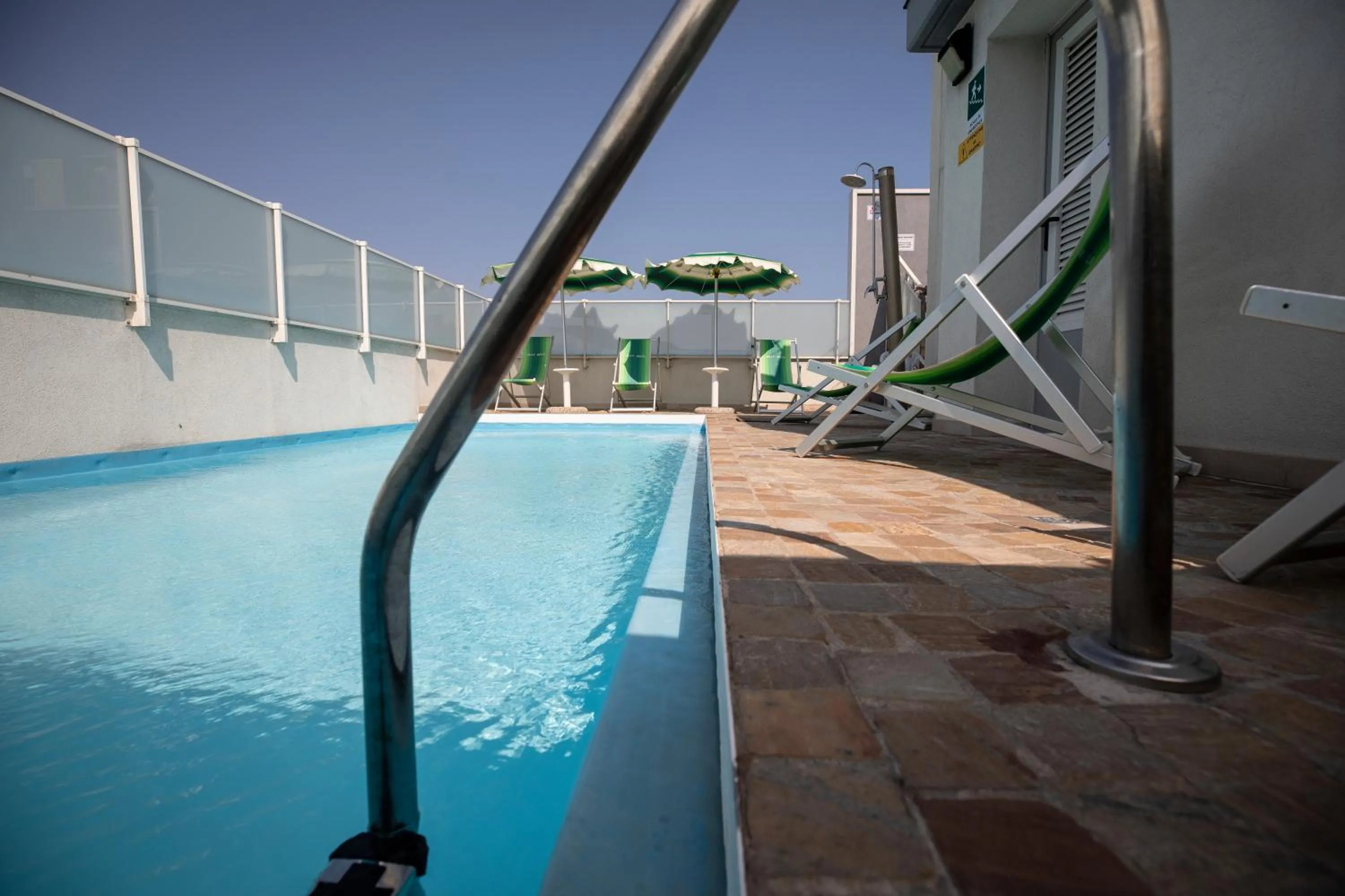 Swimming pool in Amadei Hotel Figaro & Apartments