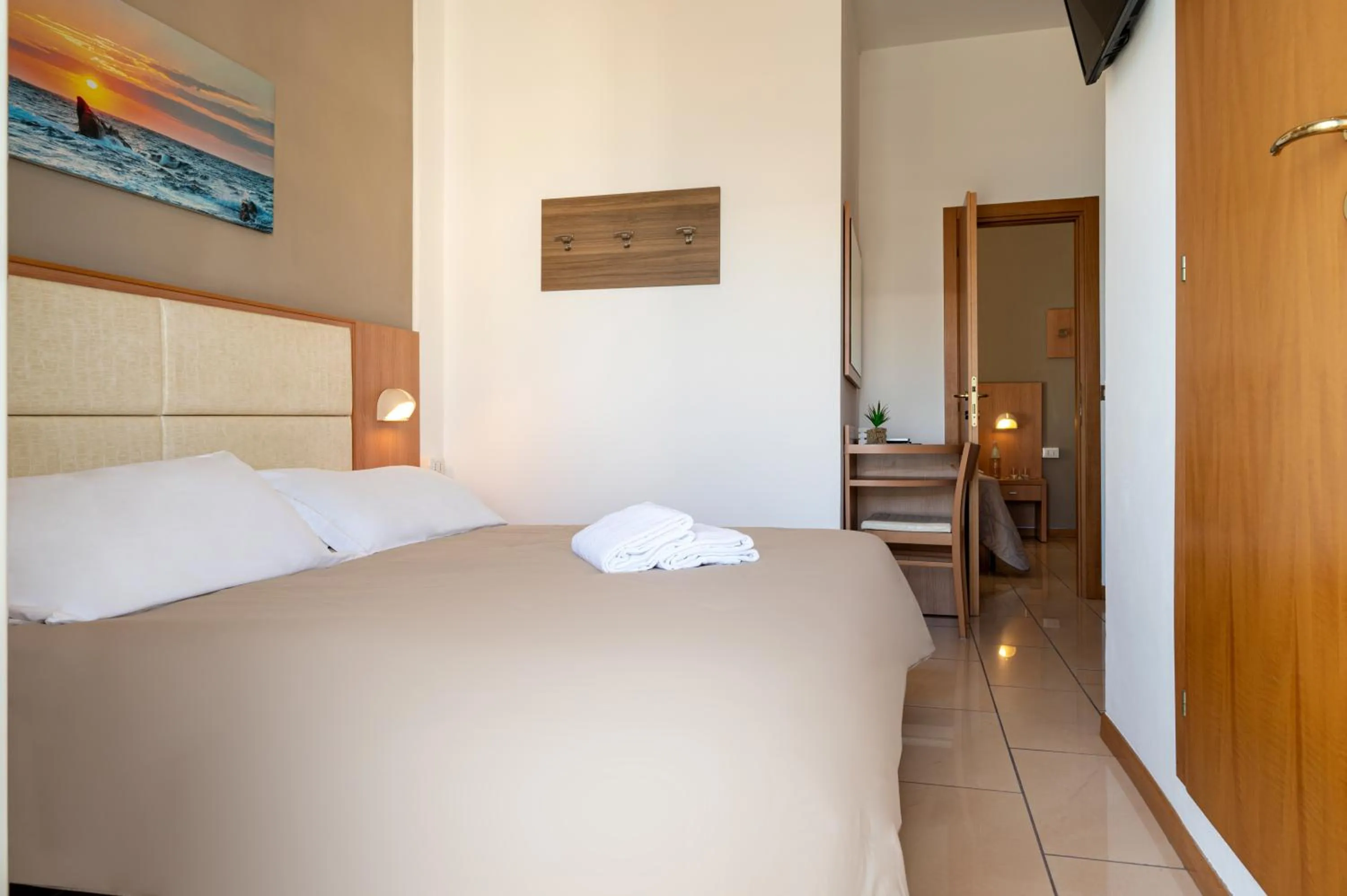 Bed in Amadei Hotel Figaro & Apartments