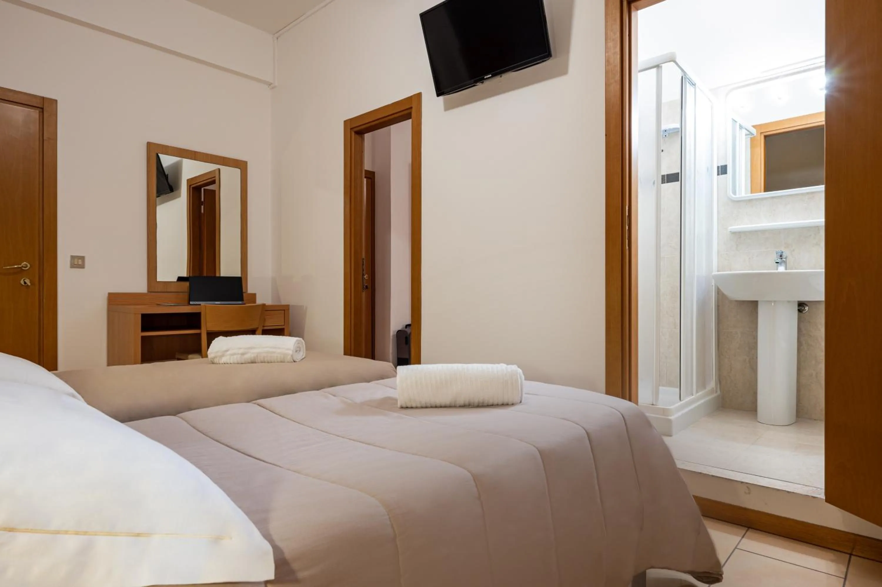 Bed in Amadei Hotel Figaro & Apartments