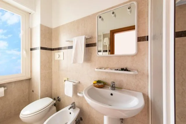 Shower in Amadei Hotel Figaro & Apartments