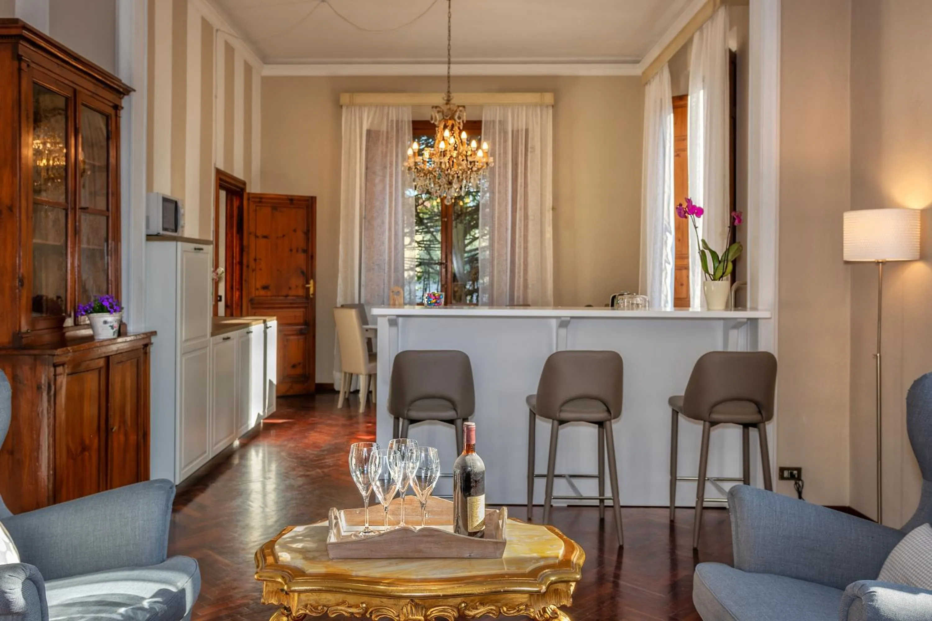 Communal lounge/ TV room in Villa Ricci Suites