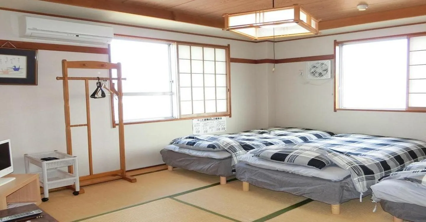 Bed in Ryokan Suzukisou-10 tatami mats and Western style room No bath and toilet - Vacation STAY 17863